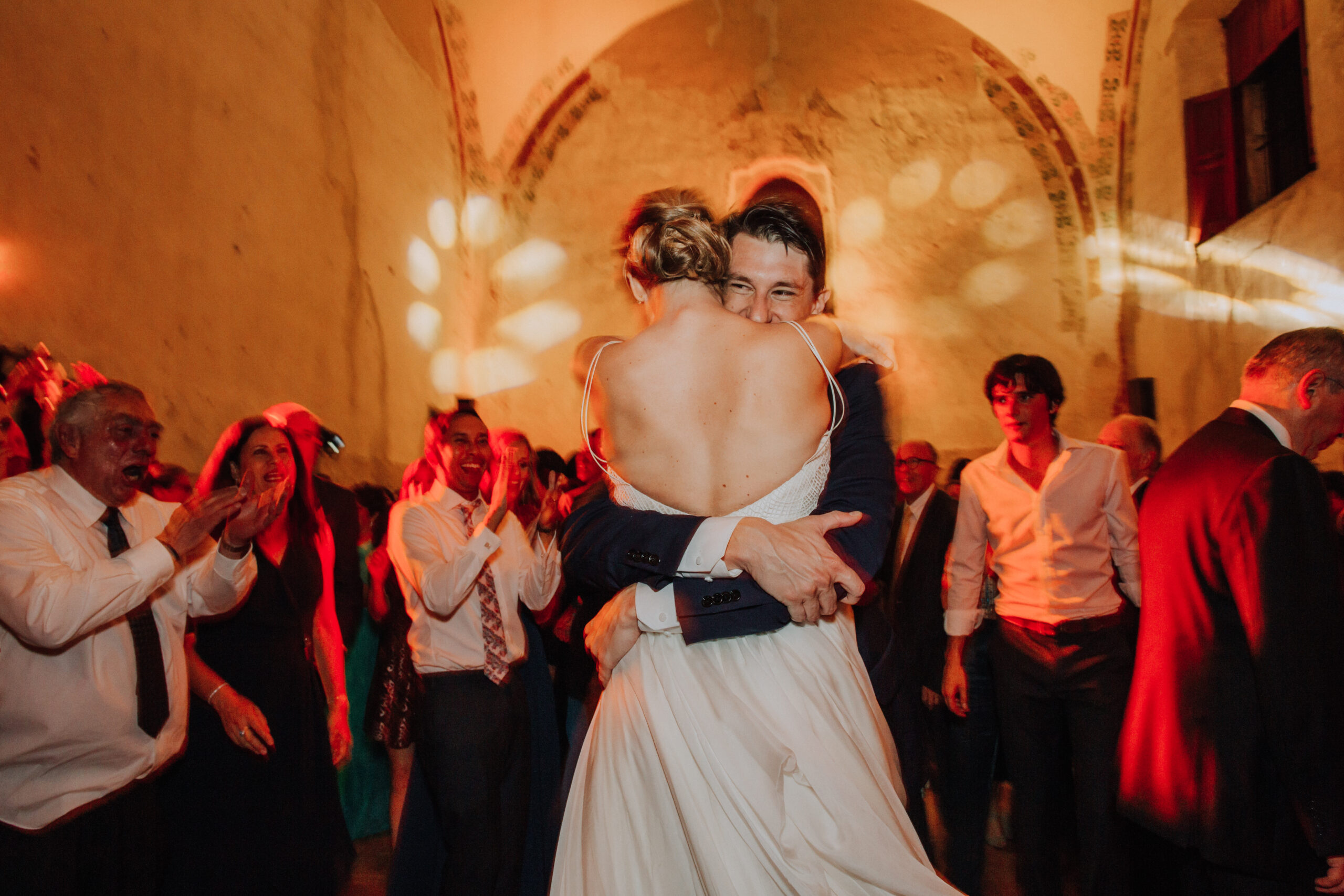 bride and groom share their first dance as husband and wife