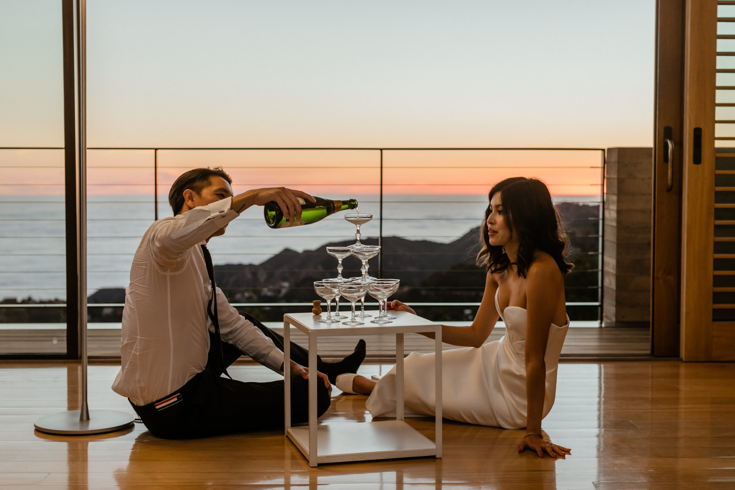 bride and groom pose together inside their stunning LA home