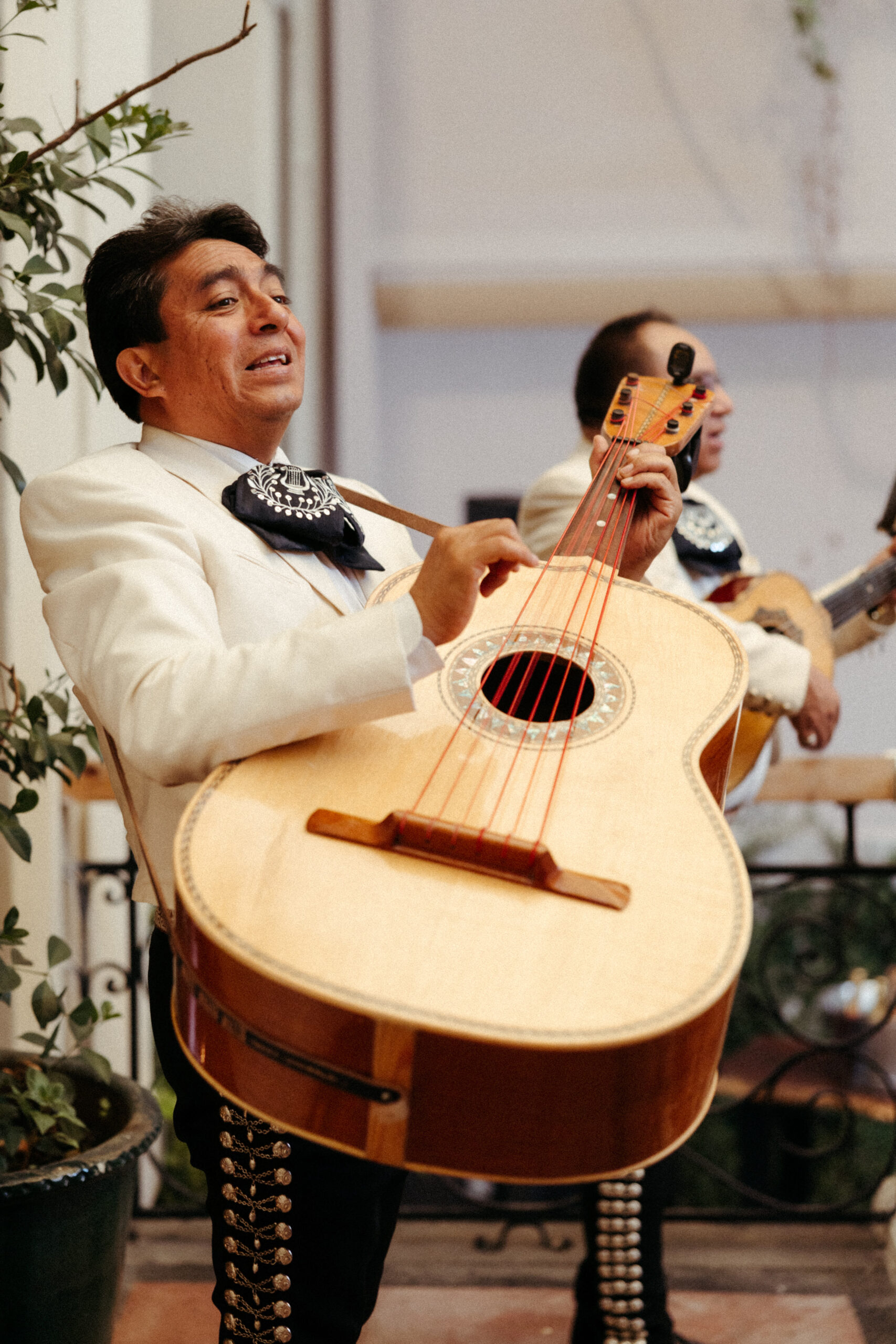 Mariachi Band plays live music from the balcony during a dreamy wedding day at Salon Barcelona in Mexico City, Mexico! 