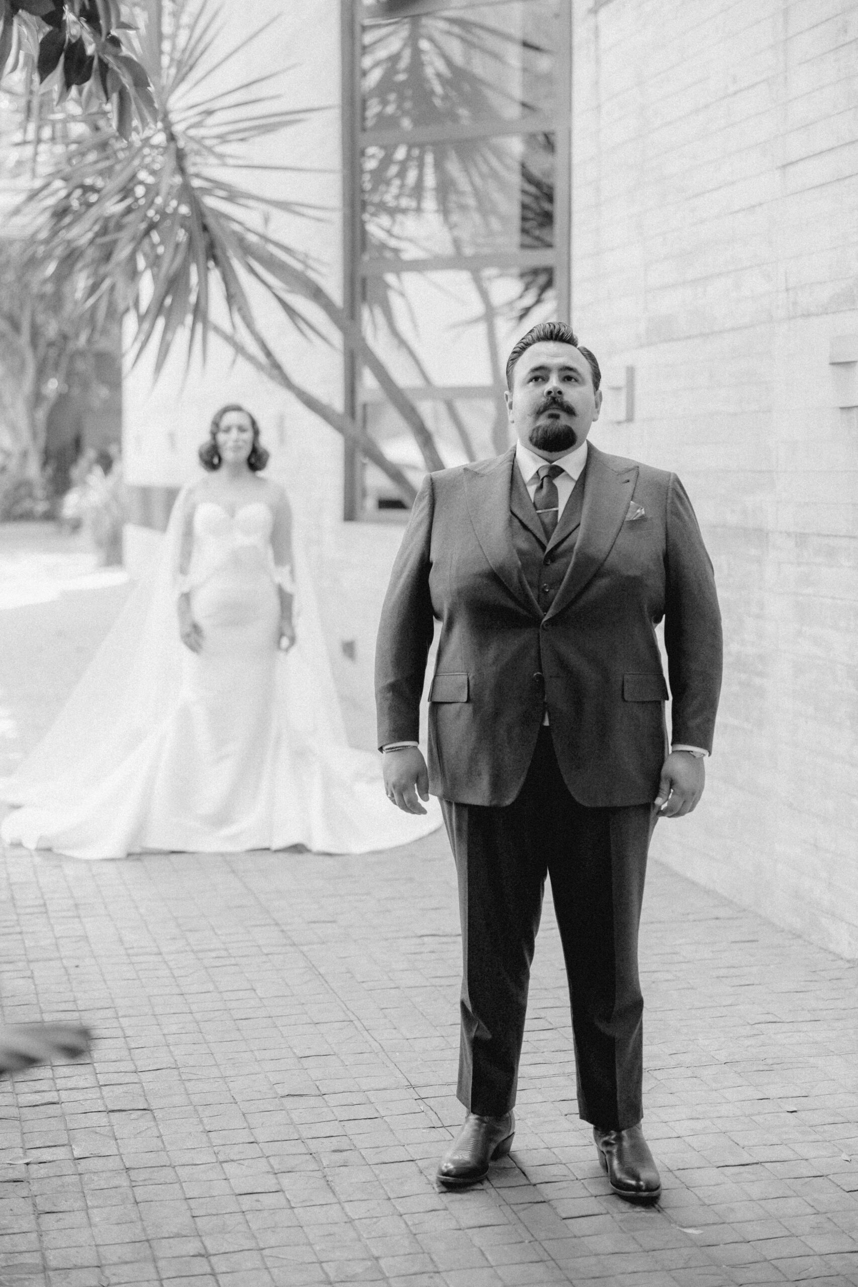 Stunning bride and groom take first look photos together outside their Sobremesa wedding venue