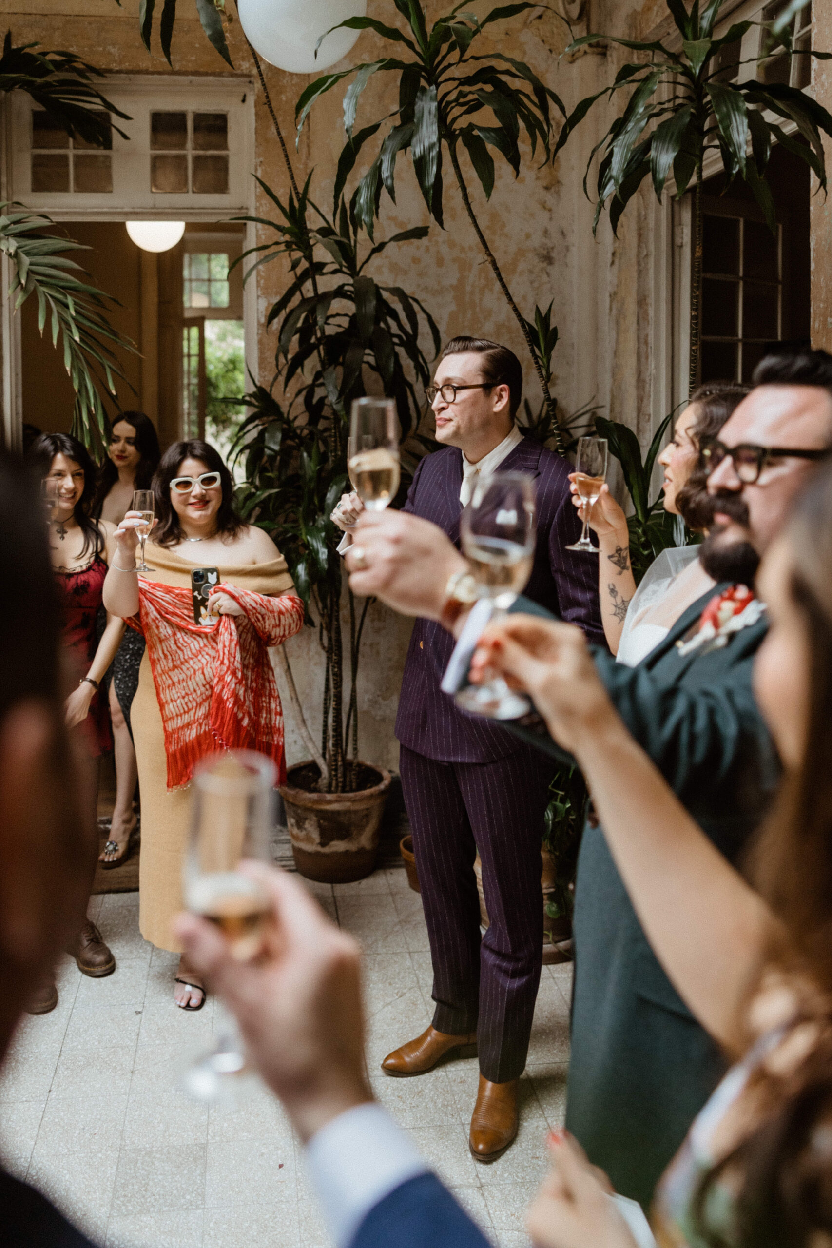 The guests toast the bride and groom during the reception