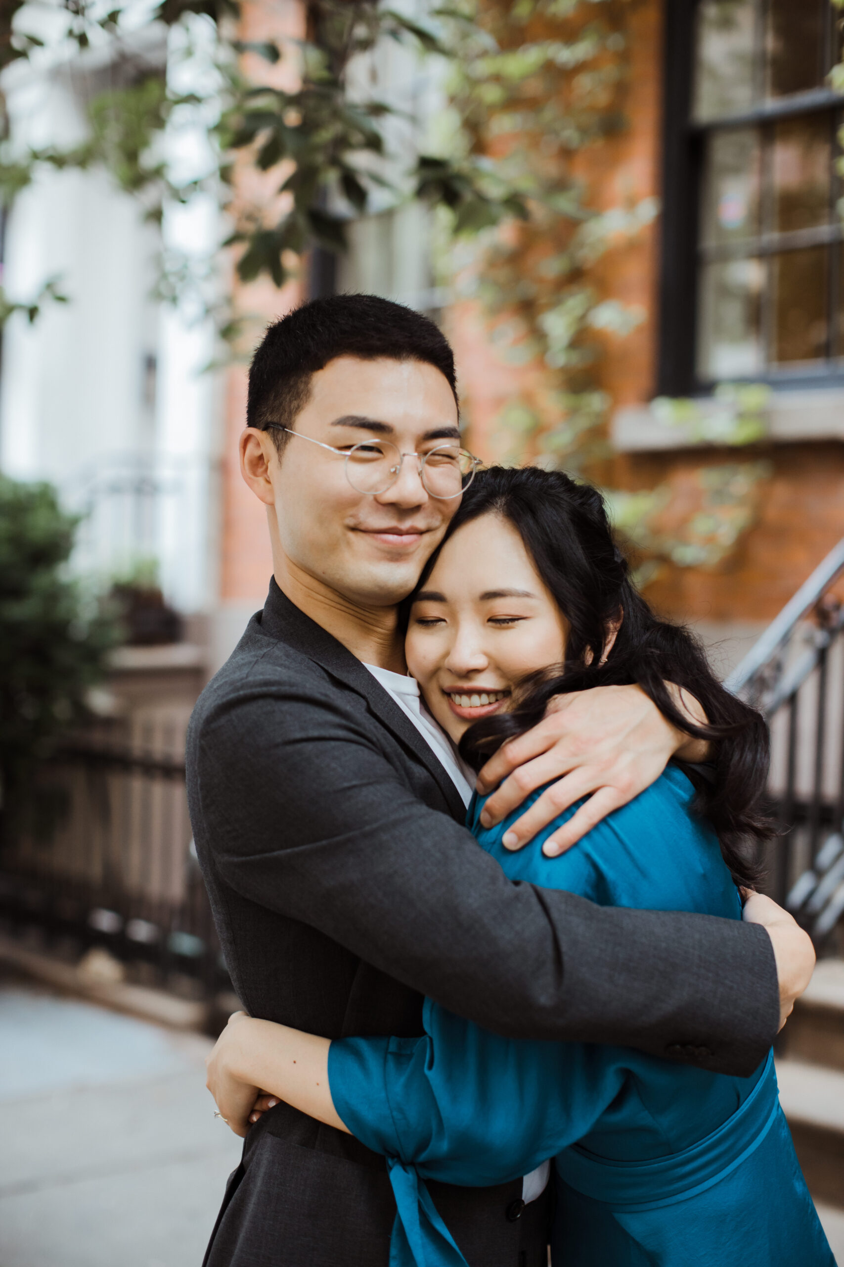 Beautiful couple embrace each other during their New York engagement session