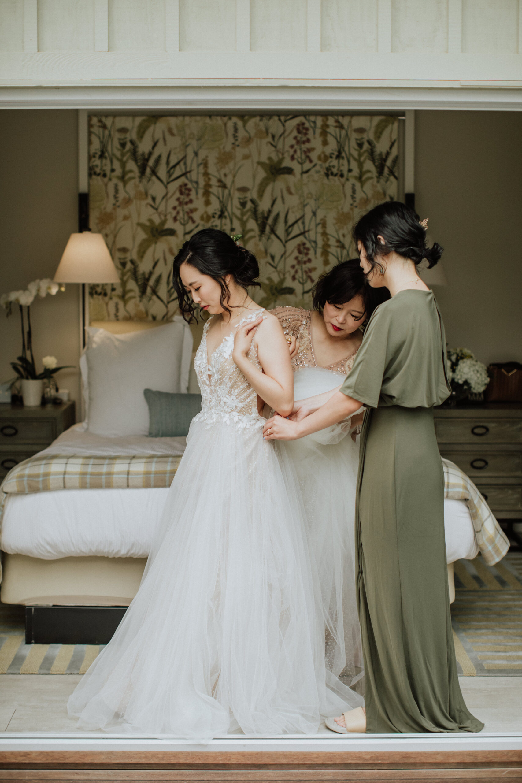 Stunning bride gets ready for her wedding day at her Napa valley vineyard wedding venue