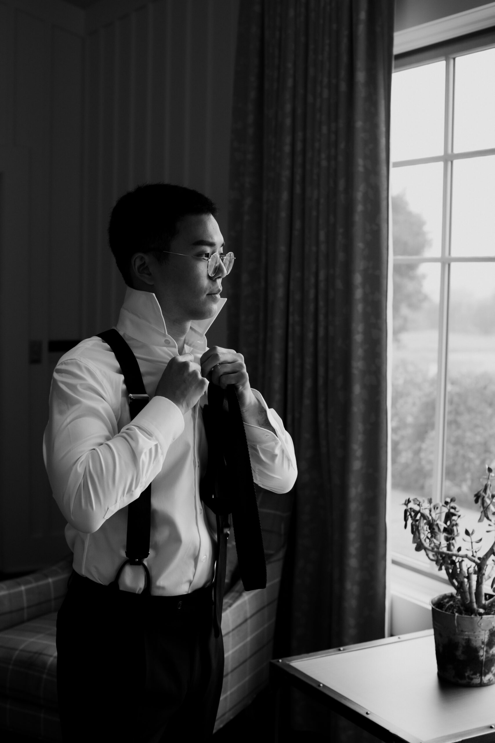 Handsome groom gets ready for his wedding day in Napa Valley