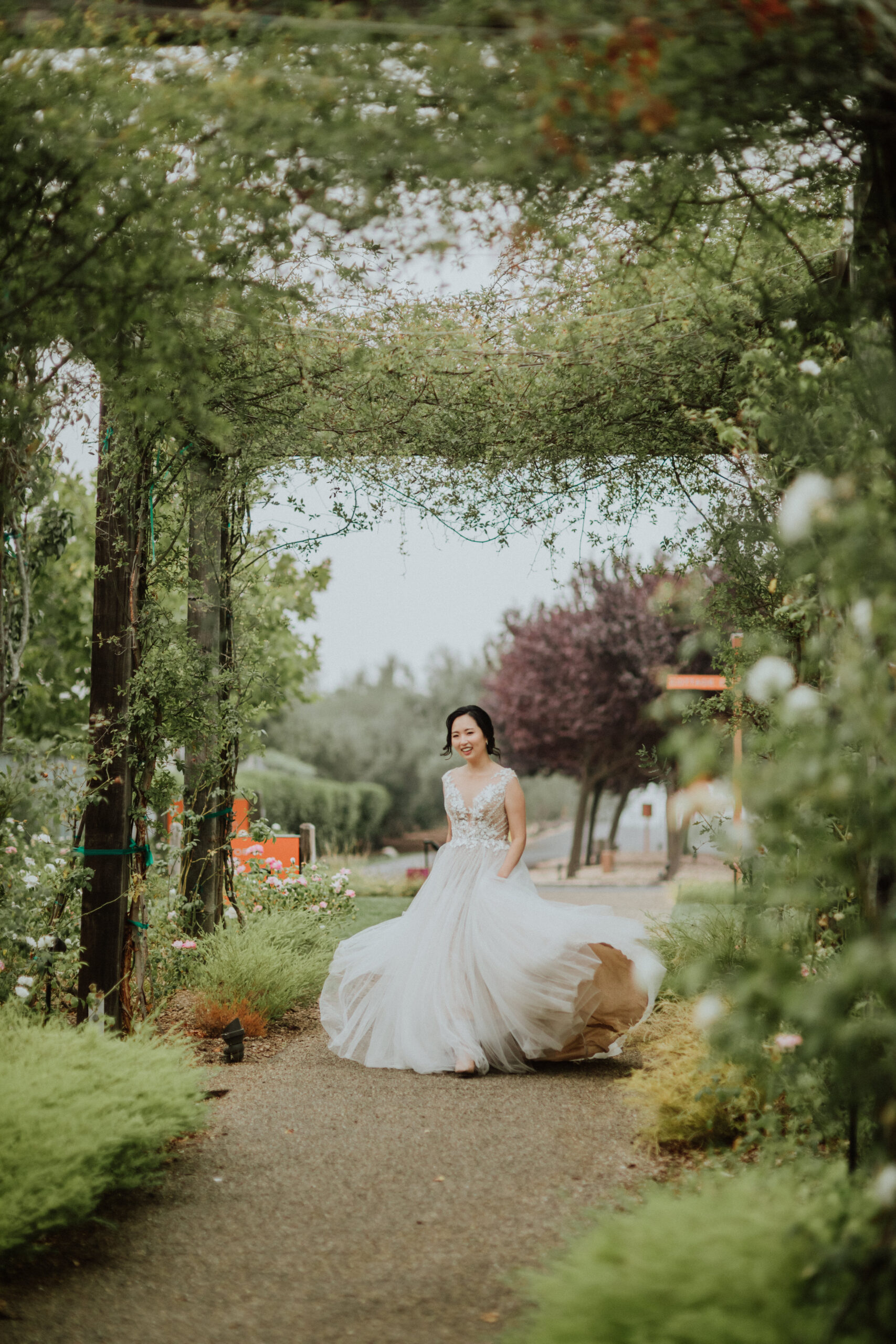 Stunning bride makes her entrance during her Napa valley vineyard wedding