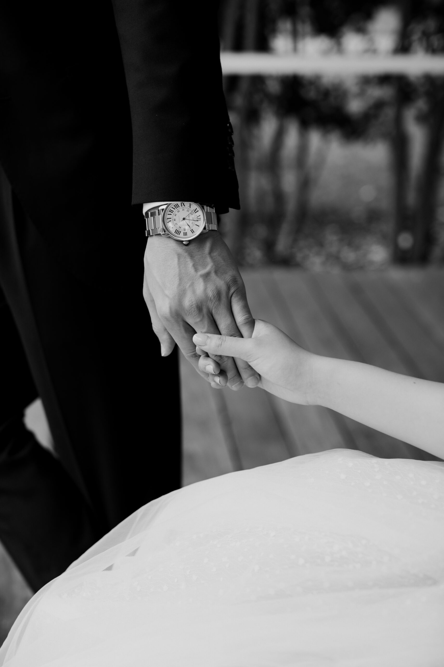Bride and groom holding hands before their Napa valley vineyard wedding