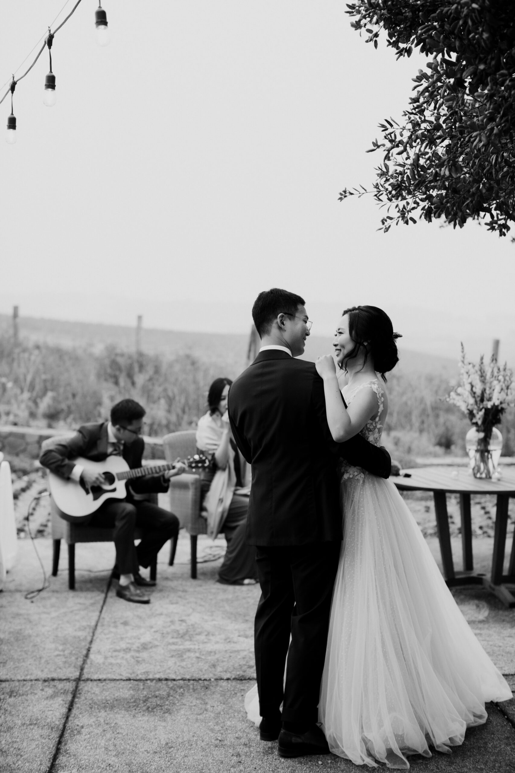 Stunning black and white photo of a bride and groom during their Napa valley vineyard wedding