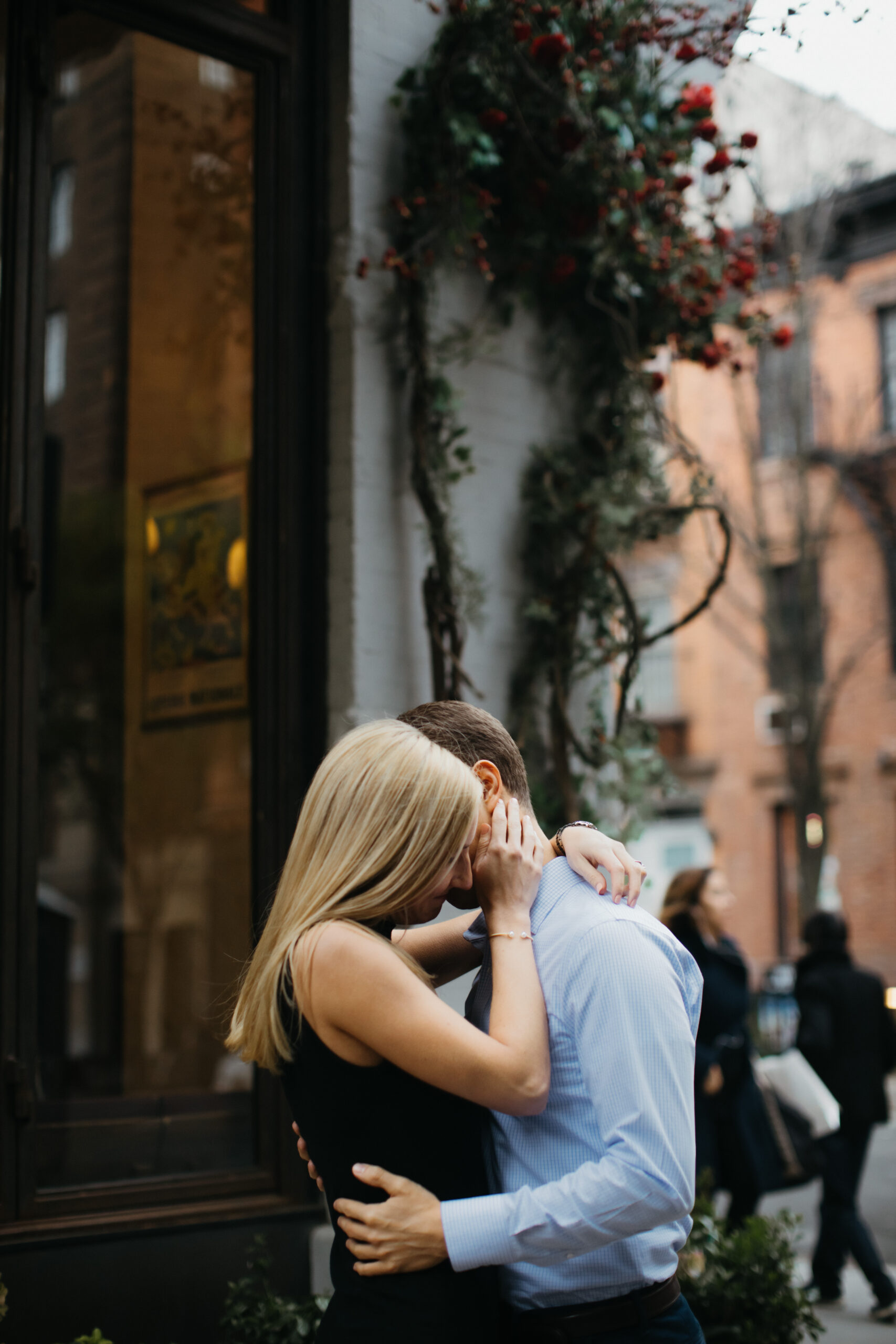 Beautiful couple shares an intimate moment during their West Village New York engagement photo session