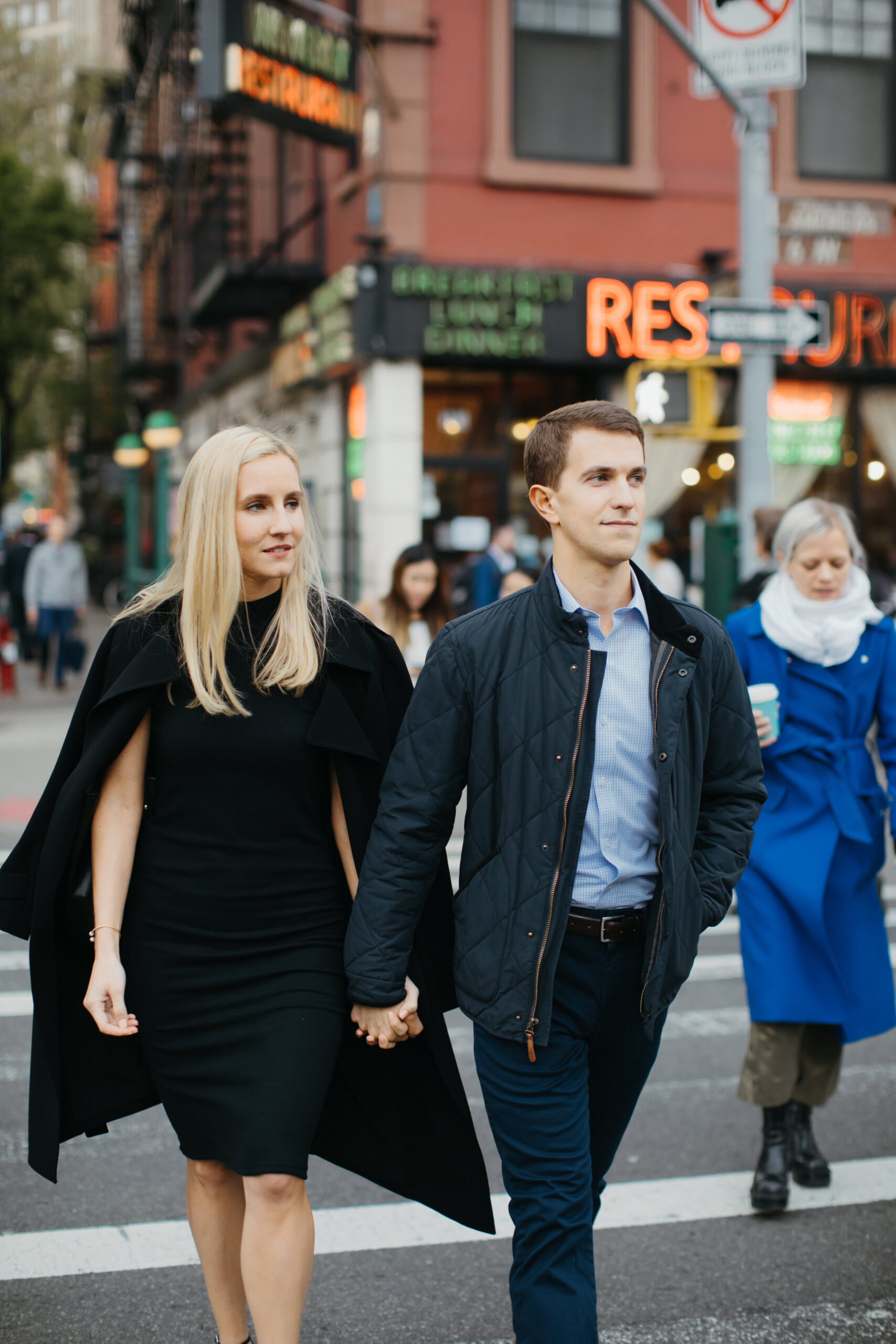 Stunning couple walk together in the West Village during their dreamy New York Engagement photoshoot