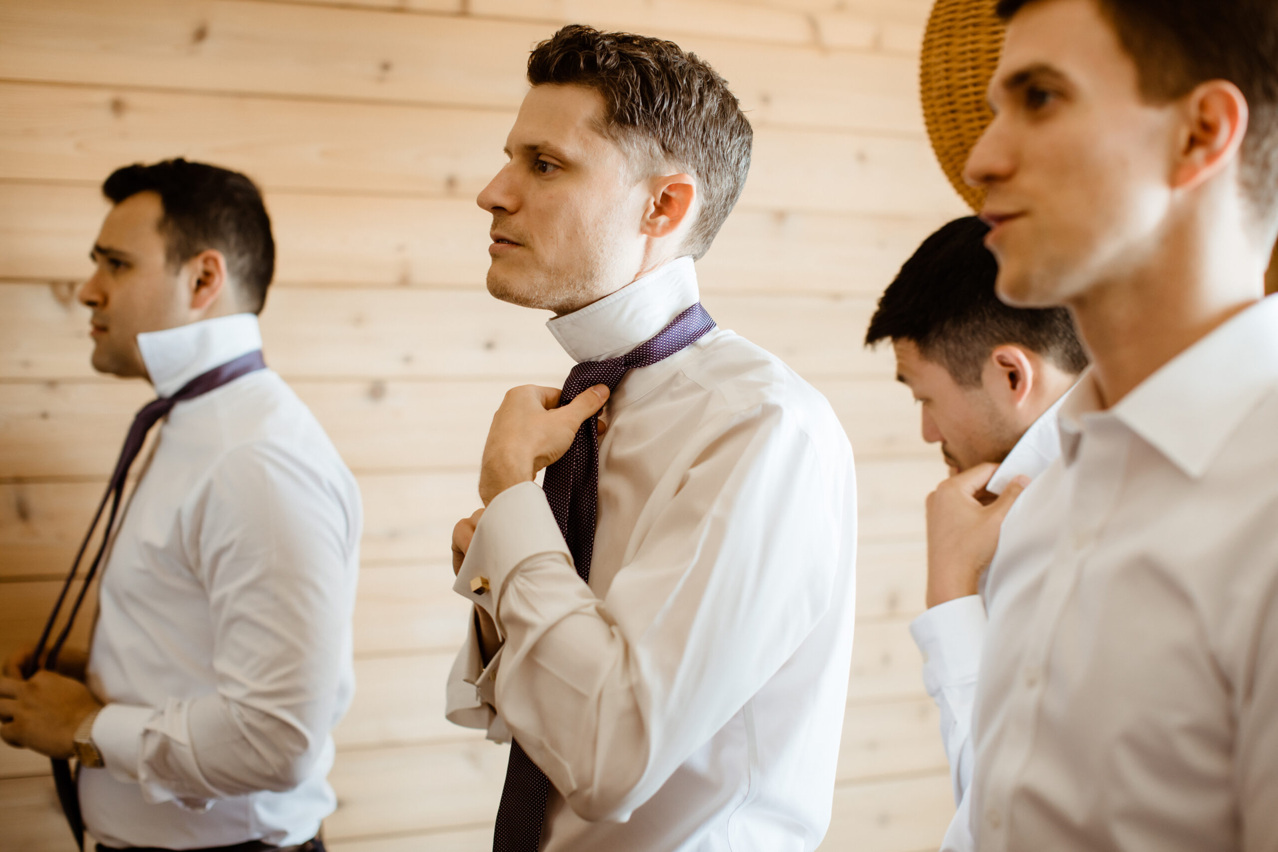 Groomsmen finish getting ready before the big day!