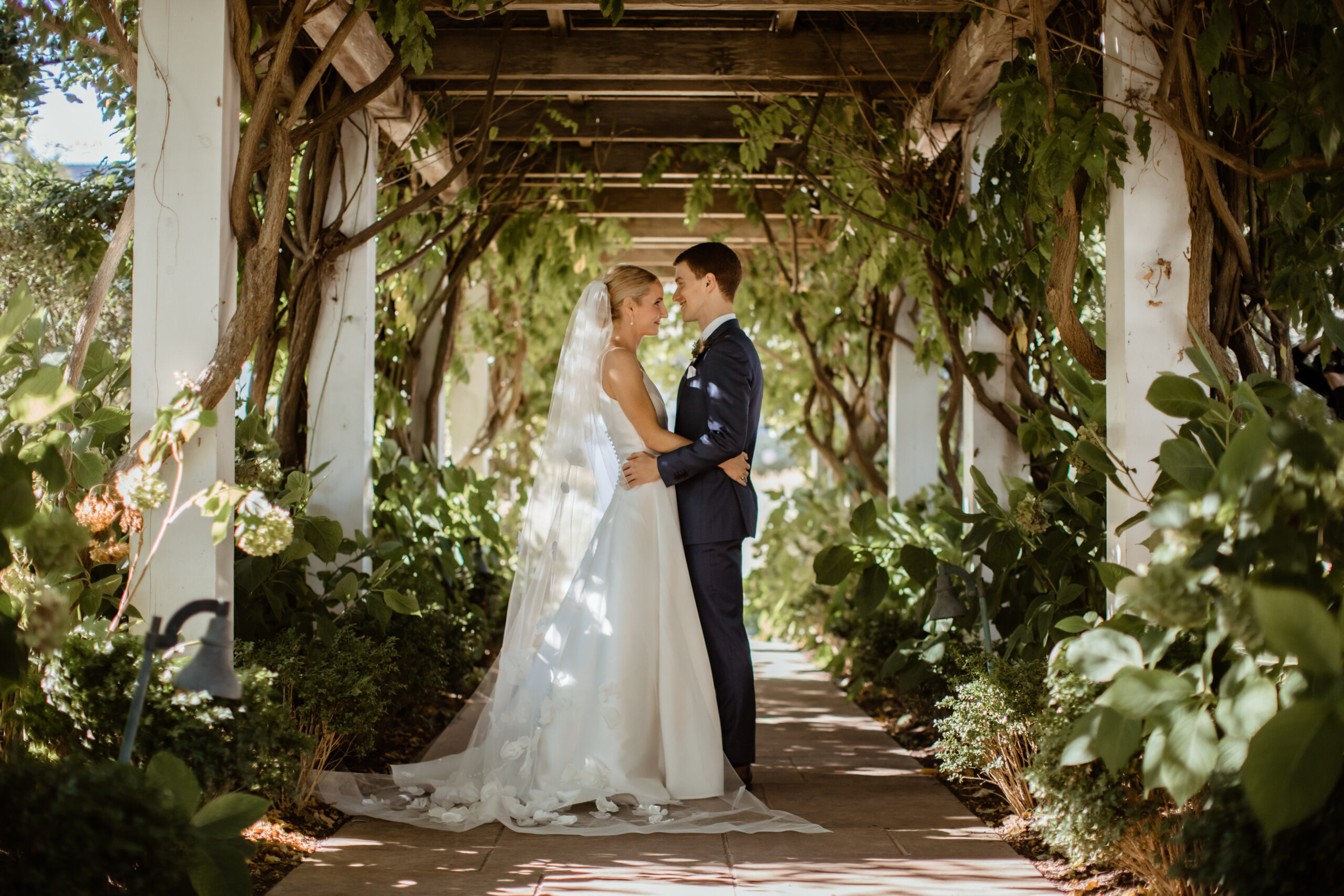Stunning bride and groom poses before their beautiful Bedell Cellars wedding