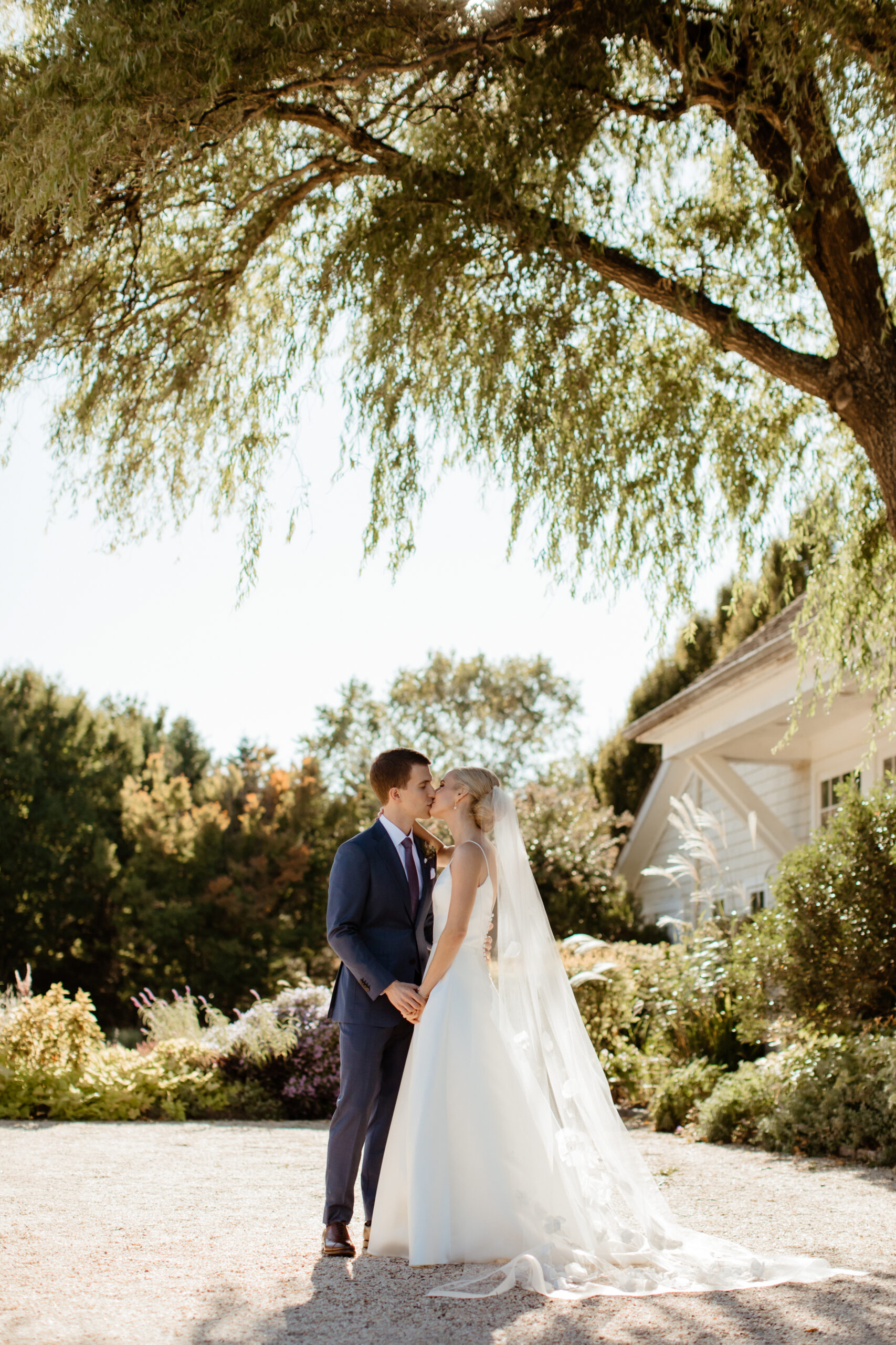 Stunning bride and groom poses before their beautiful Bedell Cellars wedding