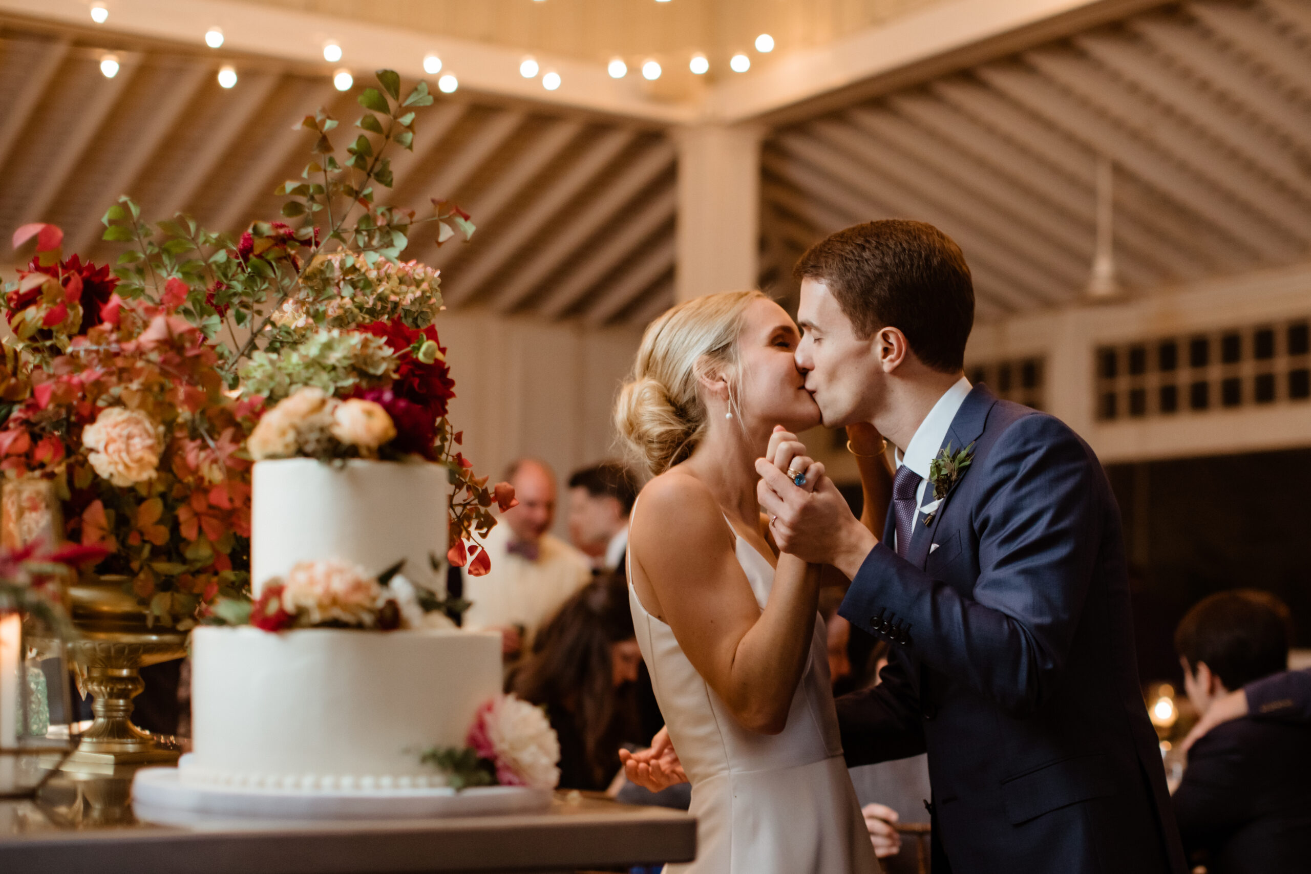 Stunning bride and groom share a kiss during their dreamy wedding day