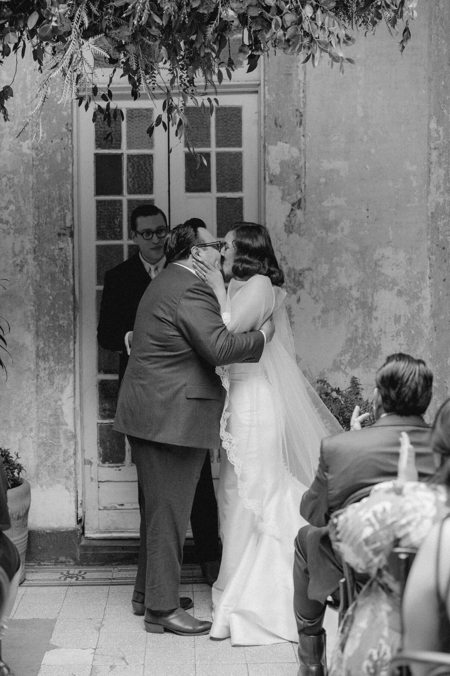 The bride and groom share their first kiss as husband and wife!