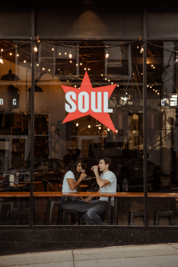 stunning couple share beers and laughs at Soul!