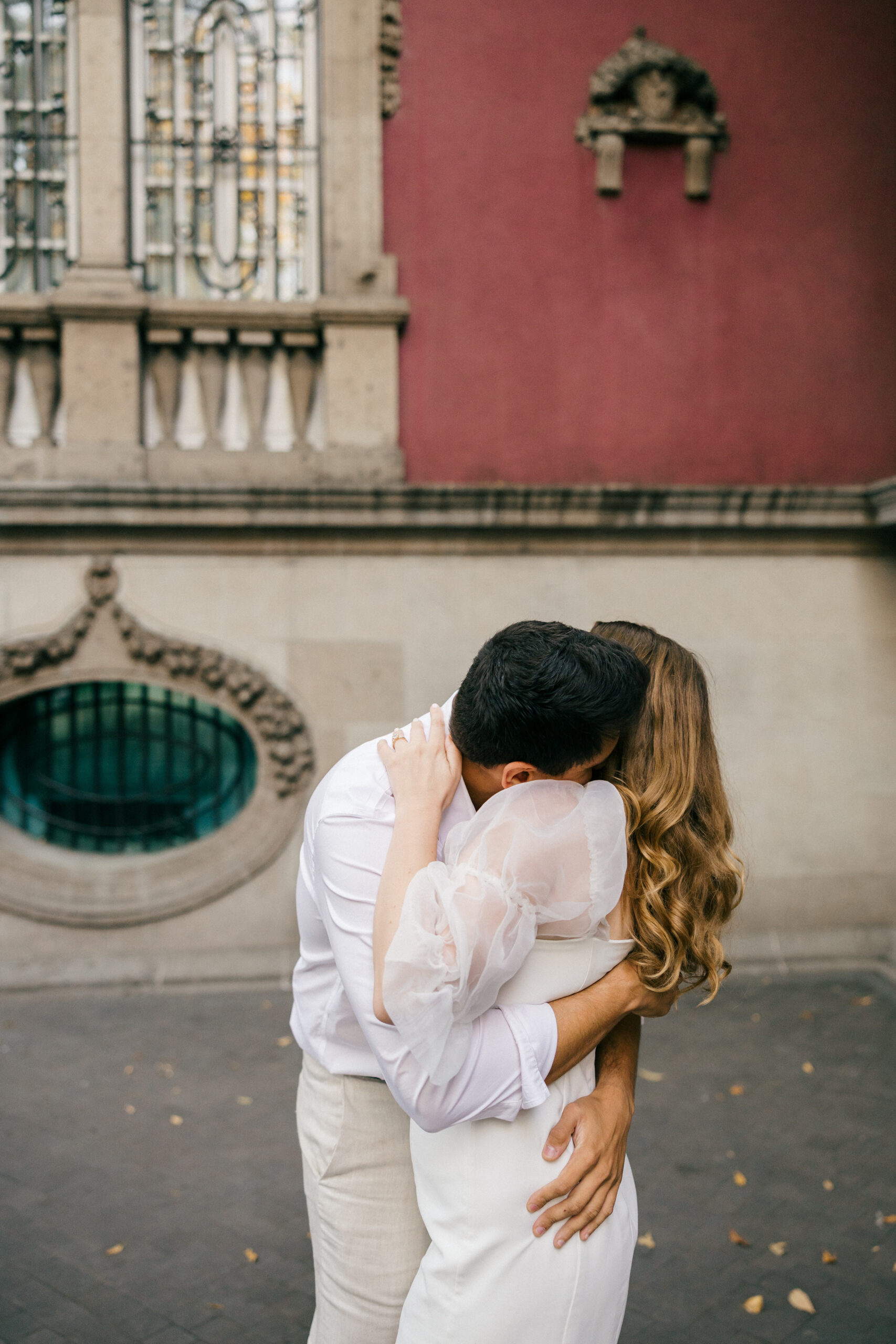 Beautiful couple shares a kiss during their Mexico city engagement photos