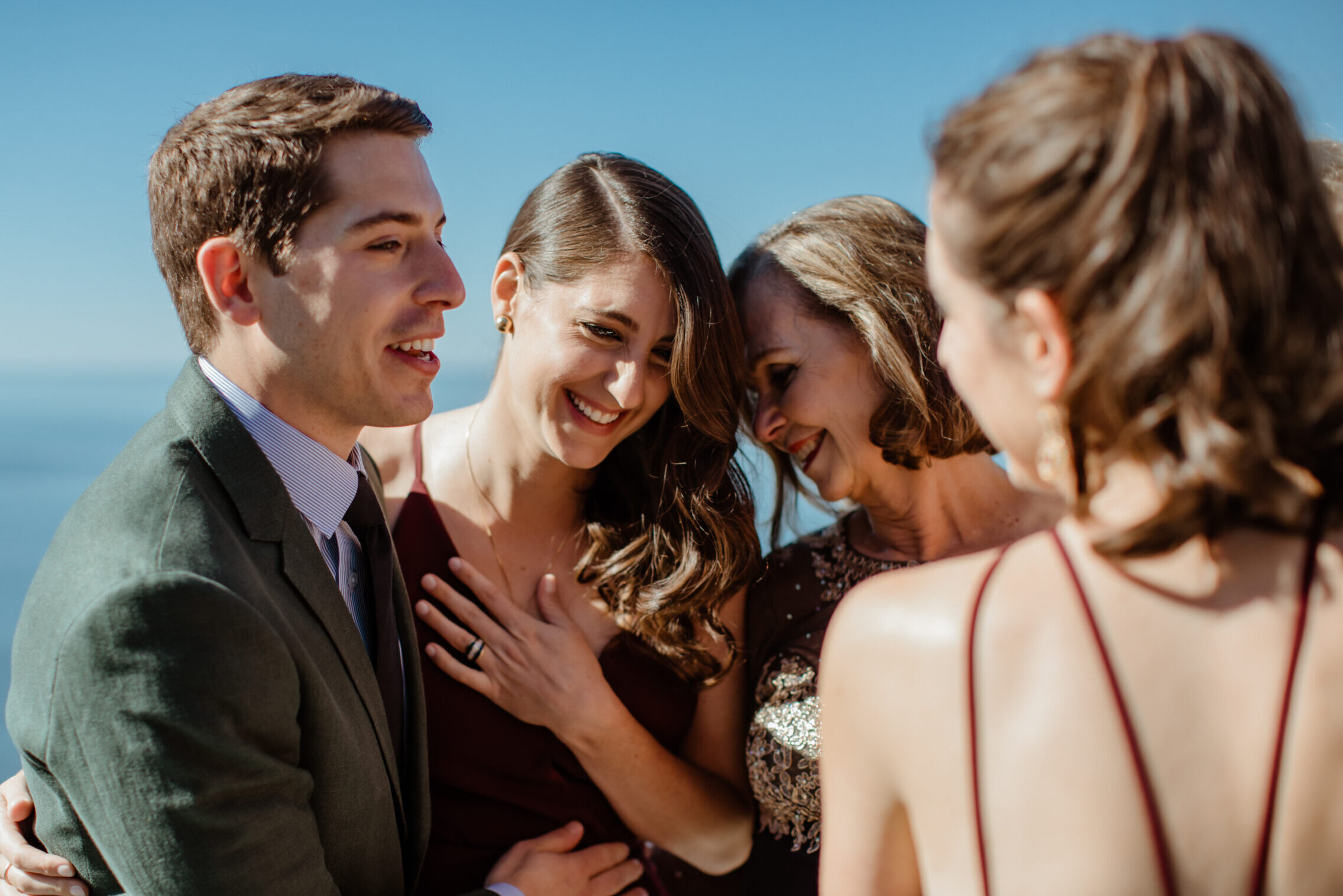 Bride poses with her friends before her dreamy Bedell winery wedding