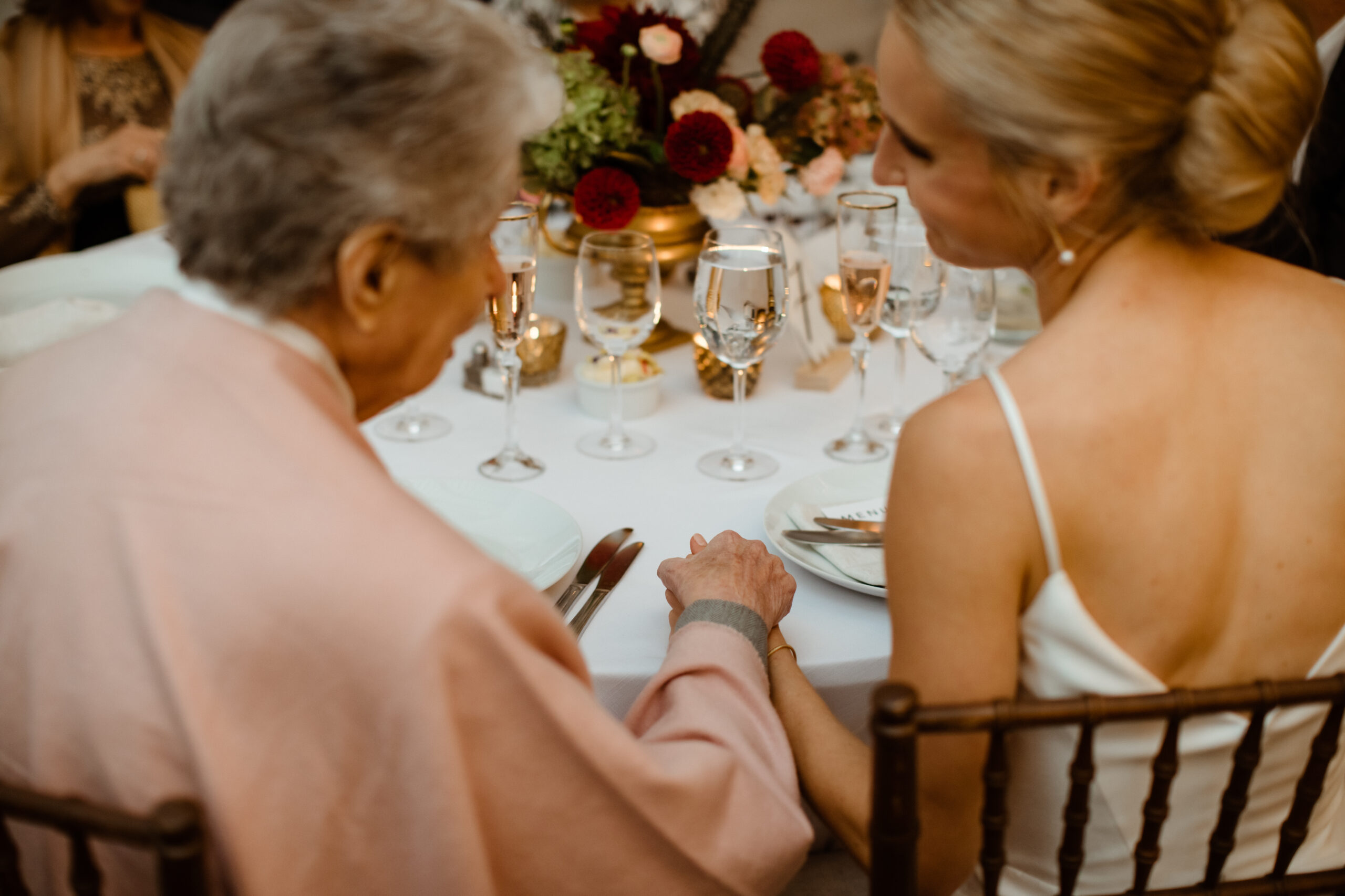 A touching moment between the bride and her grandmother on her wedding day