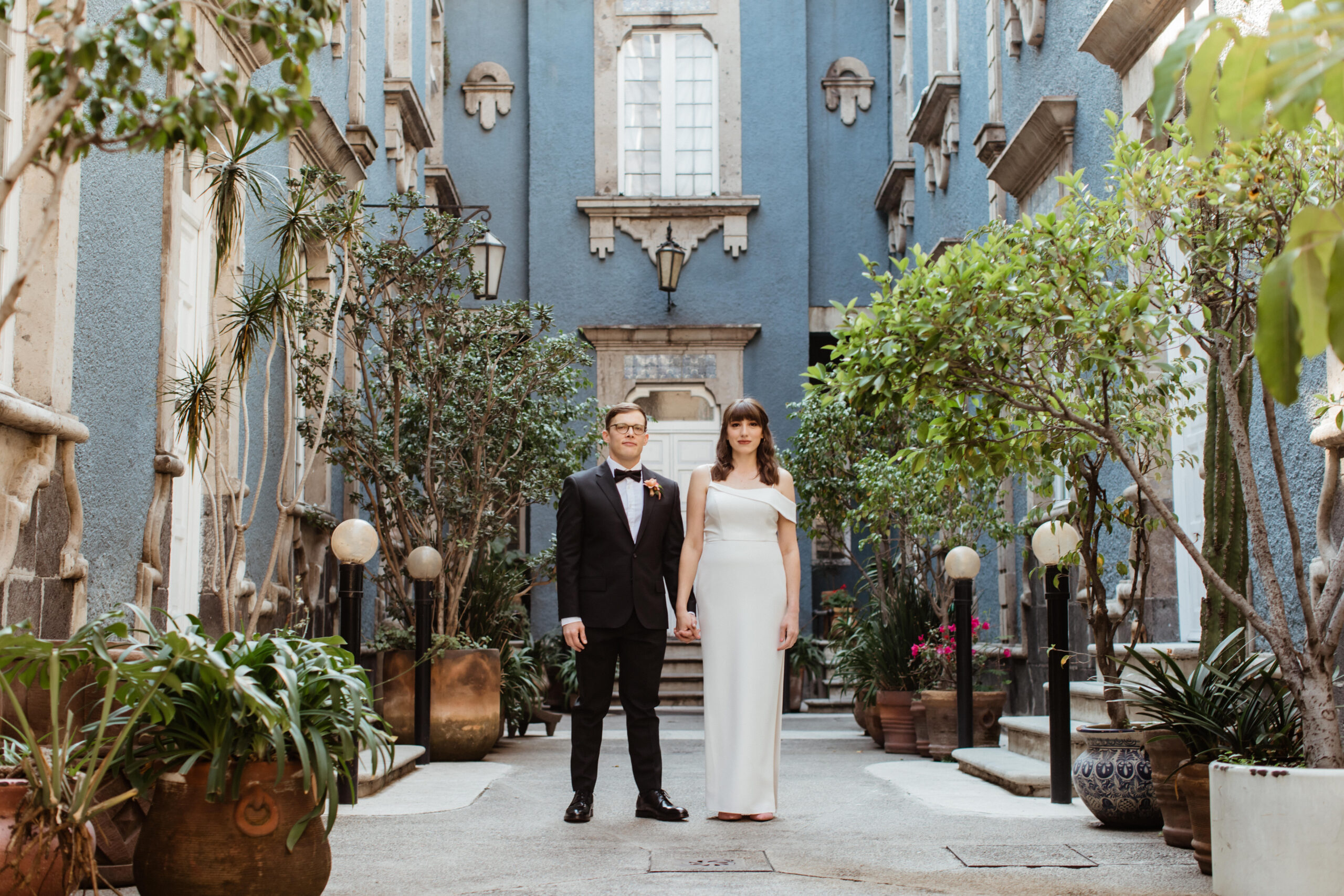 Beautiful bride and groom pose together during their stunning Autumn elopement in Mexico City