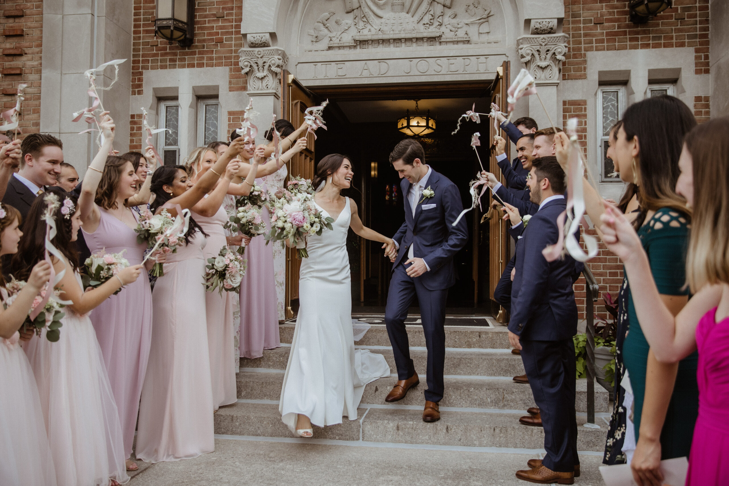 Bride and groom exit the church after their dreamy Long Island