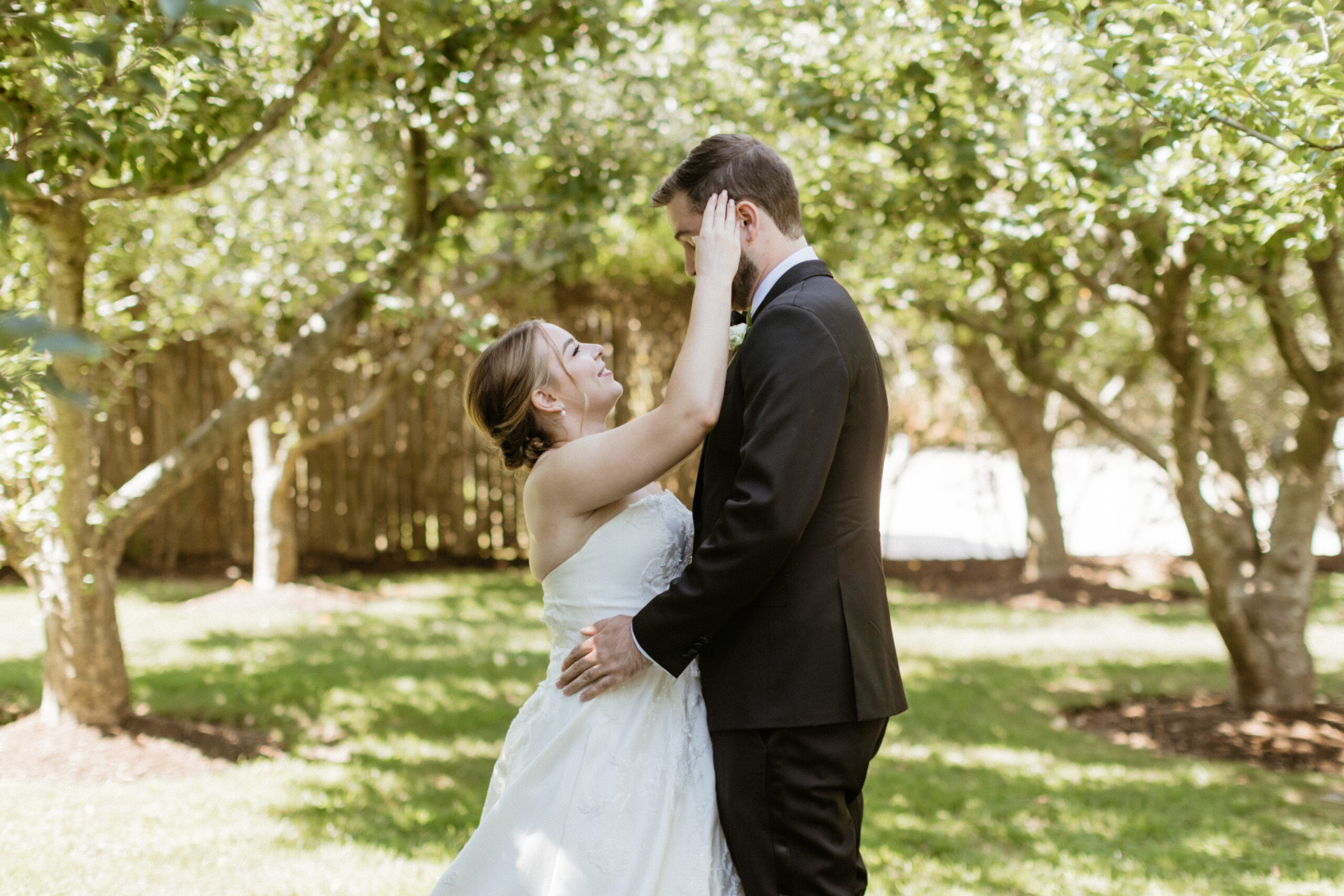 Stunning bride and groom pose together on their dreamy Bedell Winery, New York wedding day