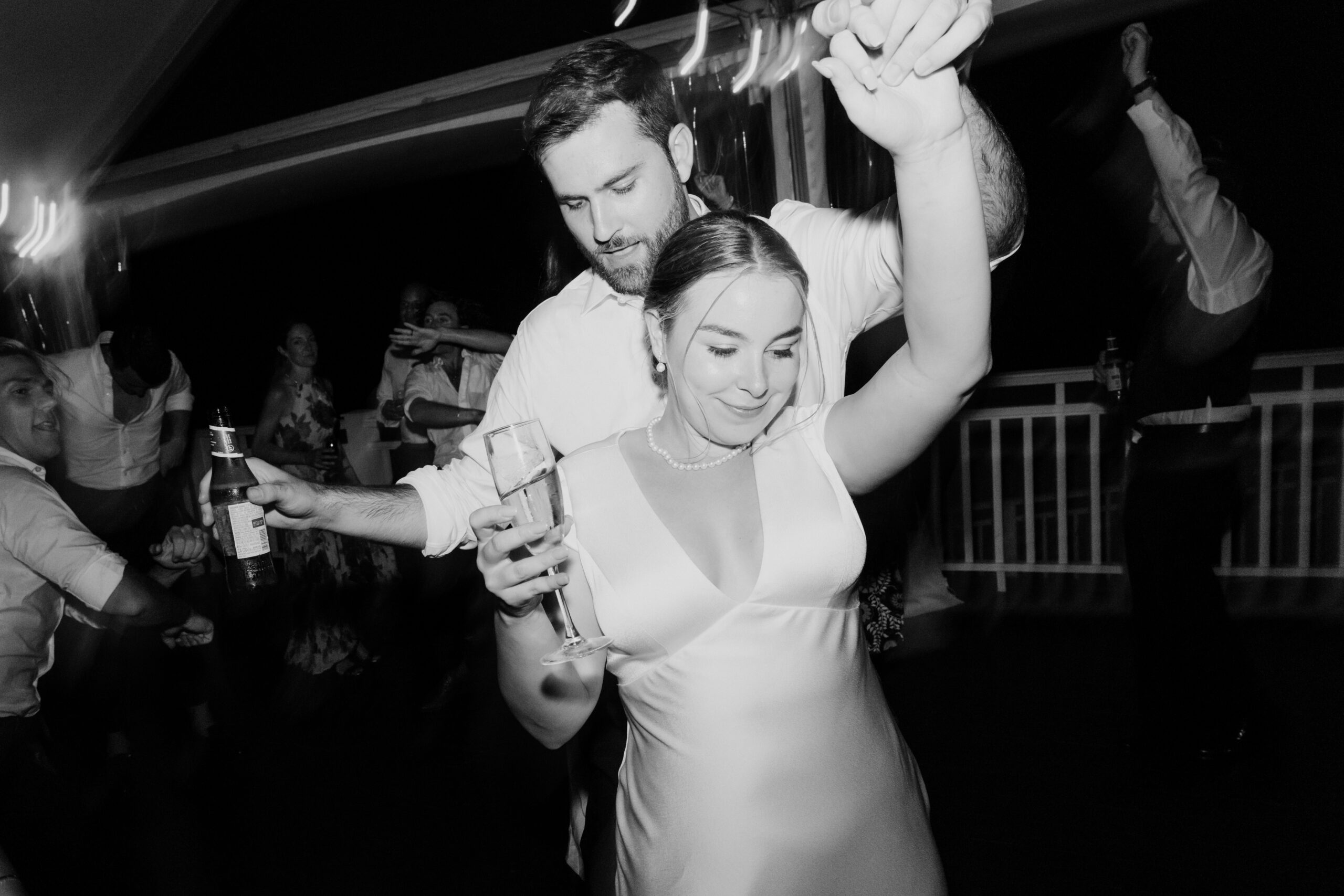 New husband and wife dance together at their stunning Bedell Winery, NY wedding reception