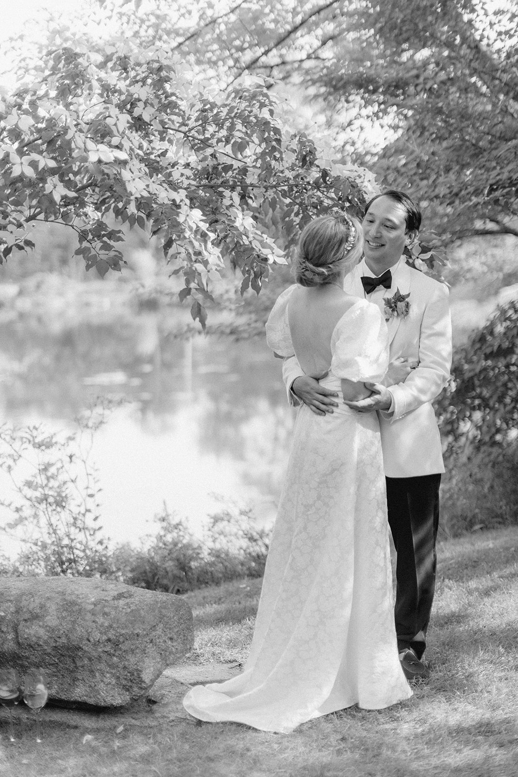bride and groom pose together after their dreamy Maine summer wedding