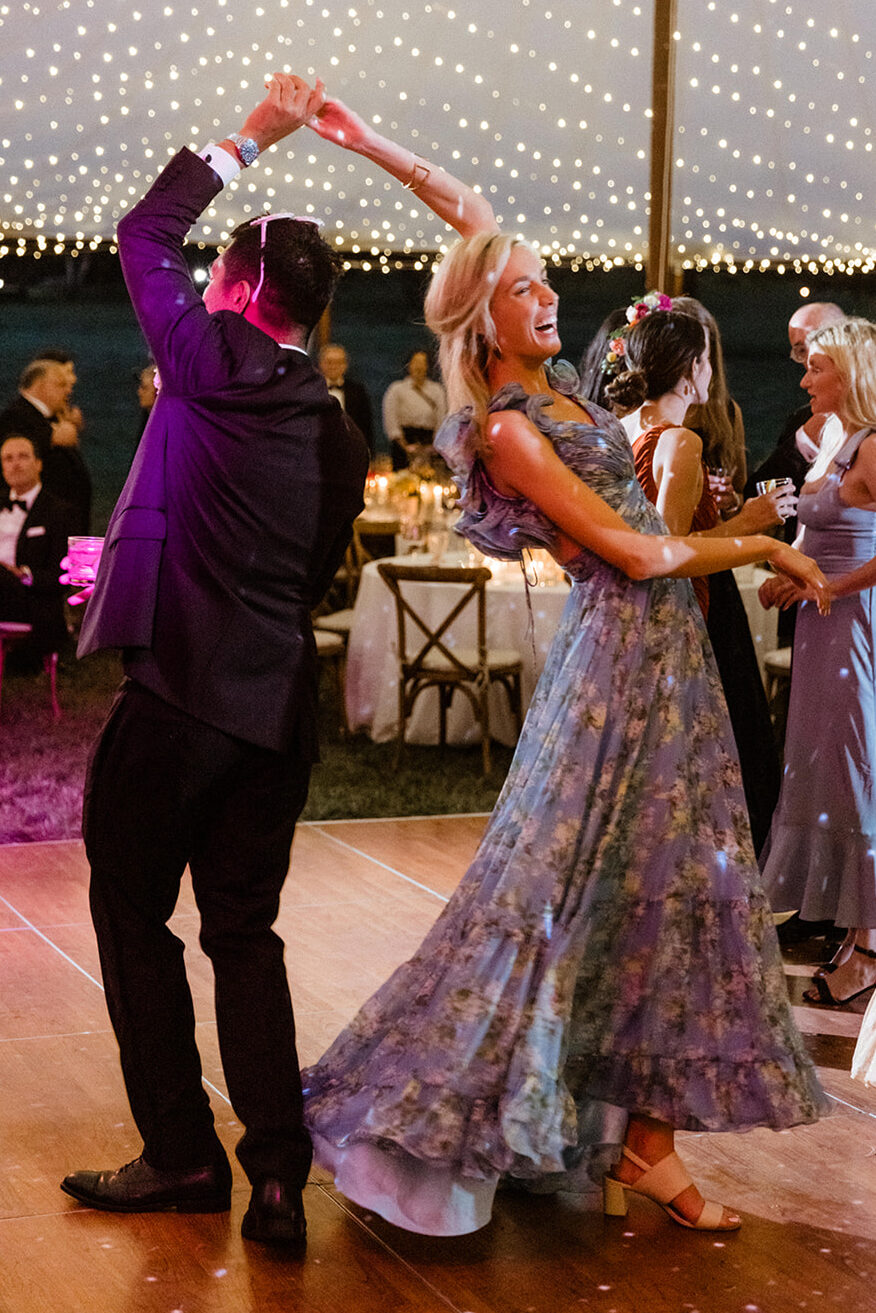 guests dance and celebrate during the stunning Maine wedding reception 