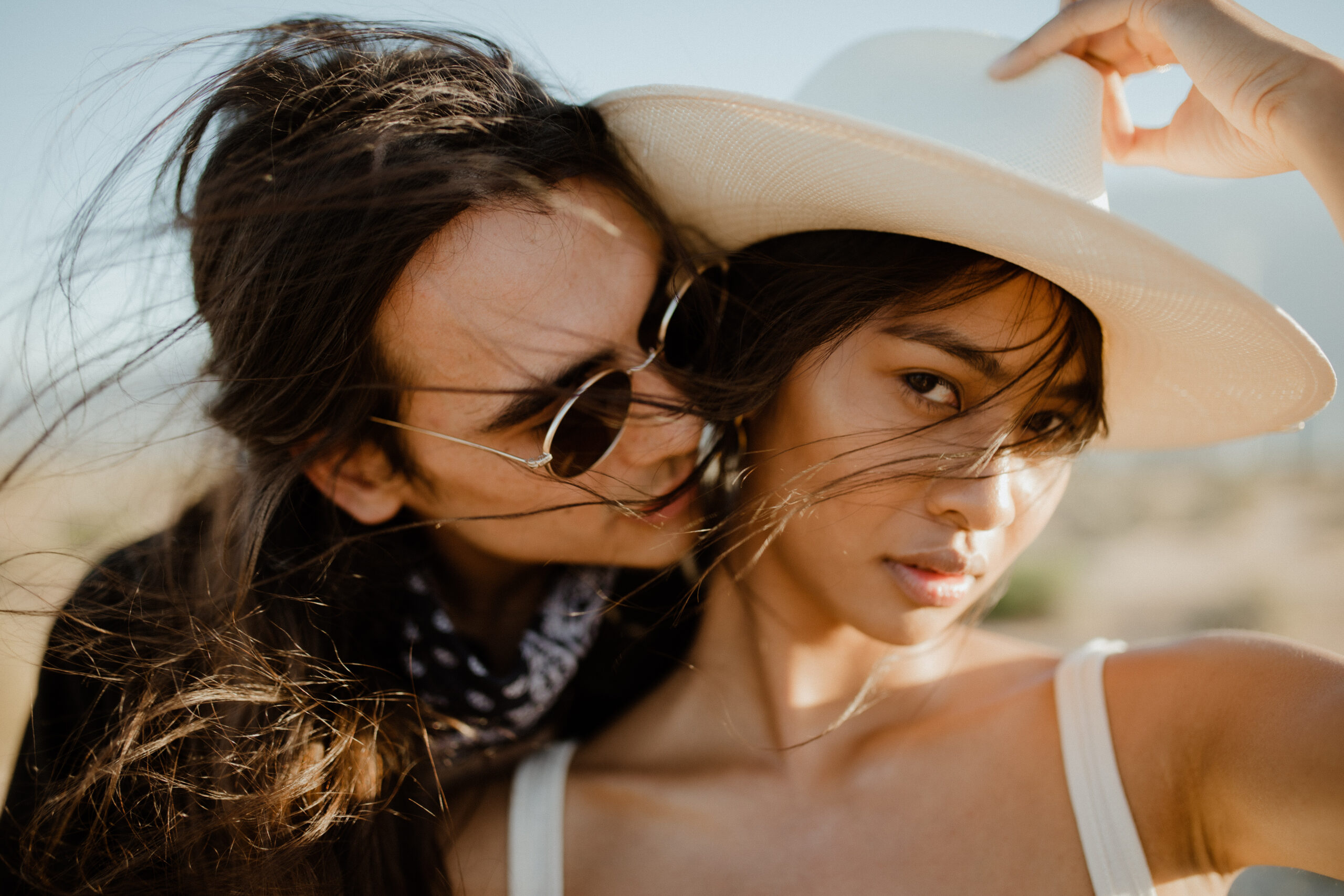 couple pose during their romanticism desert engagement photos
