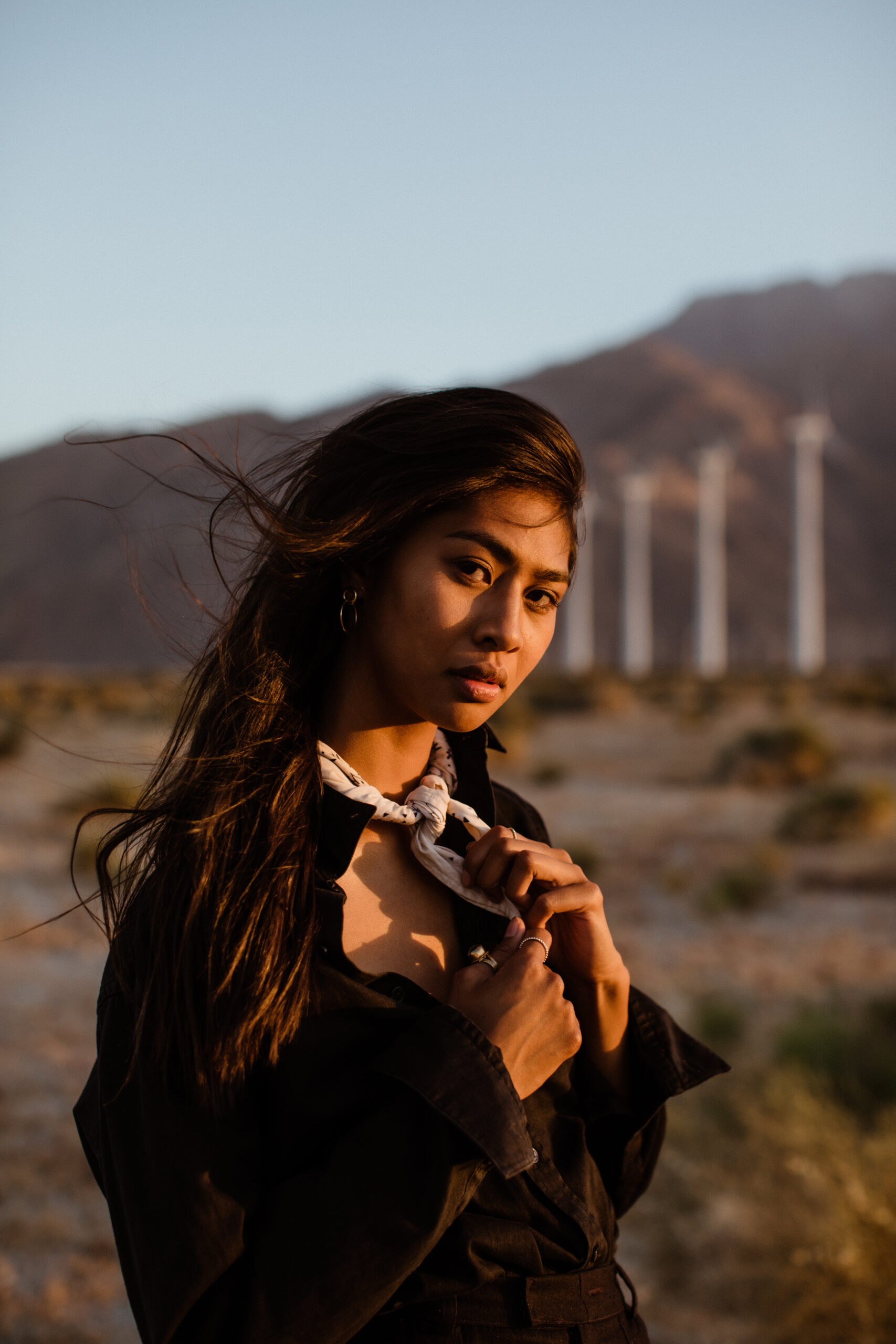 beautiful girl poses during her desert engagement photoshoot