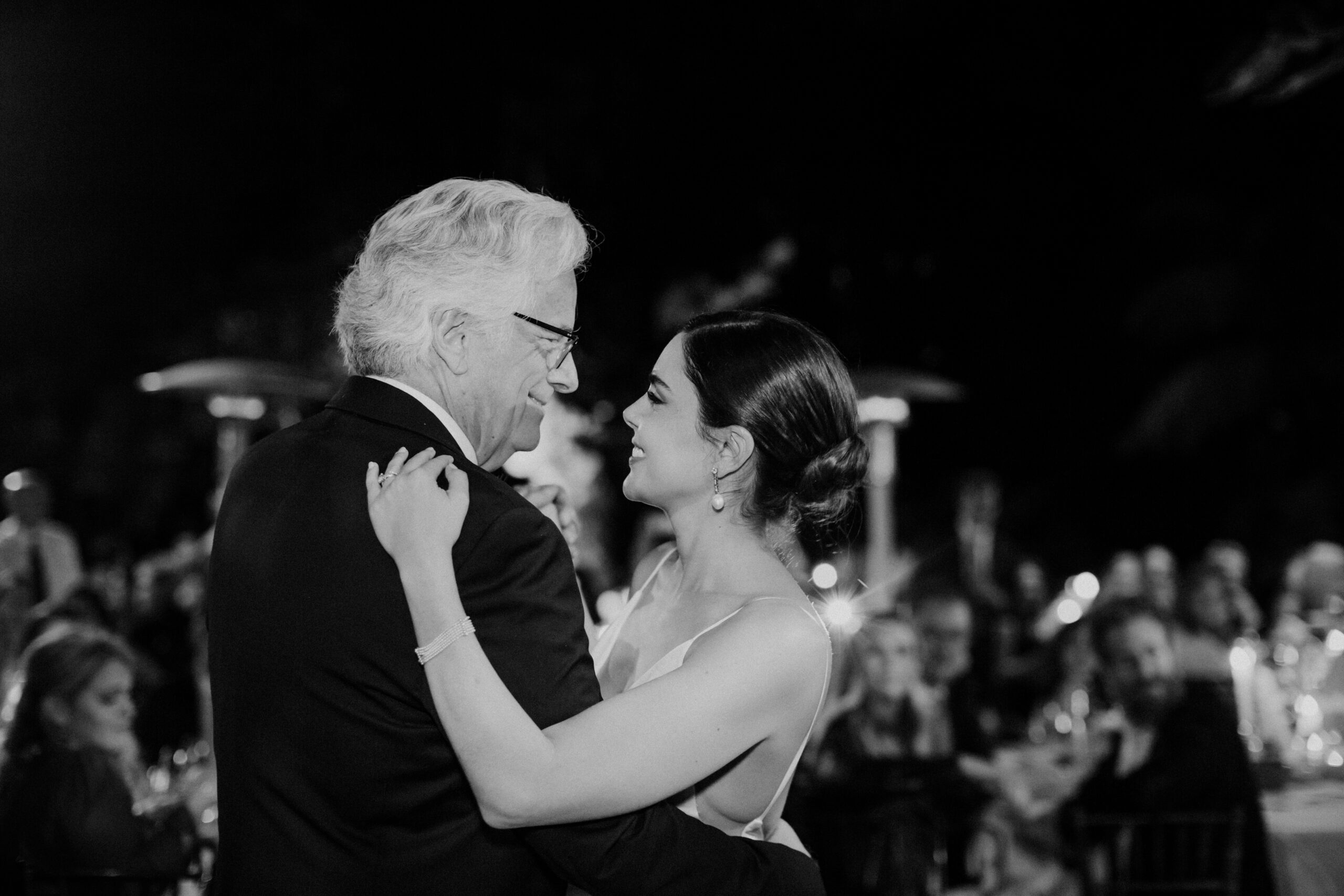 bride shares a dance with her dad during her dreamy wedding reception 