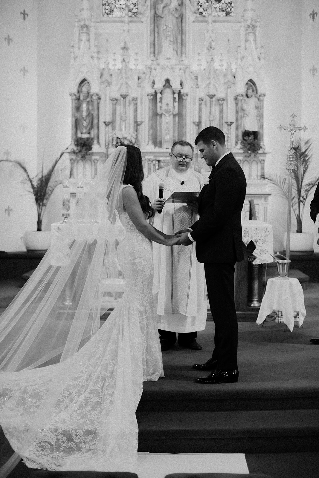 bride and groom marry in a classic church wedding venue