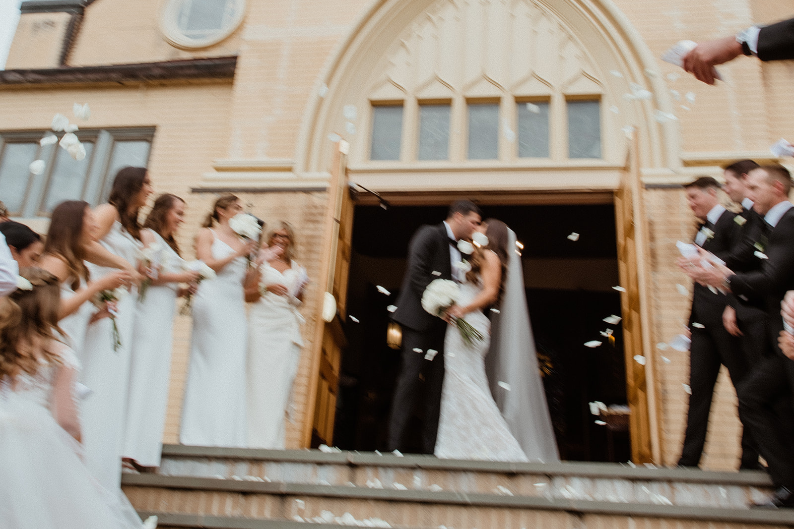 gorgeous bride and groom pose together after their church wedding on long island