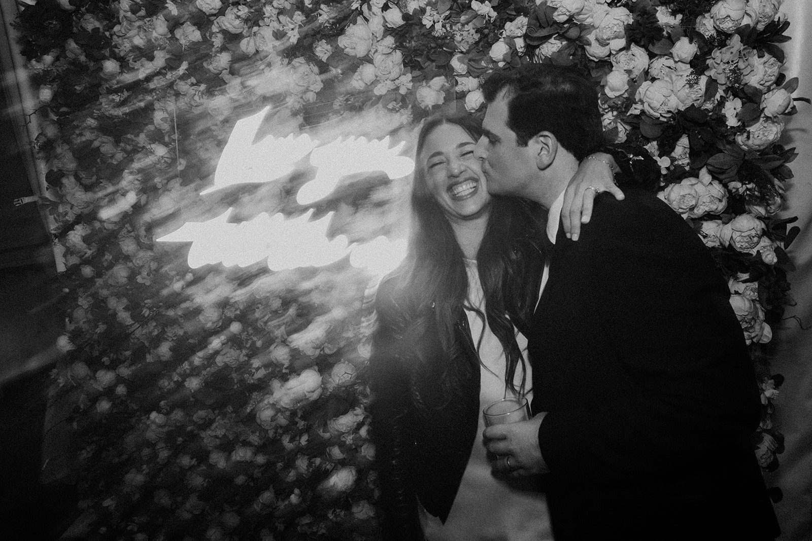 gorgeous bride and groom pose together after their vineyard wedding on long island