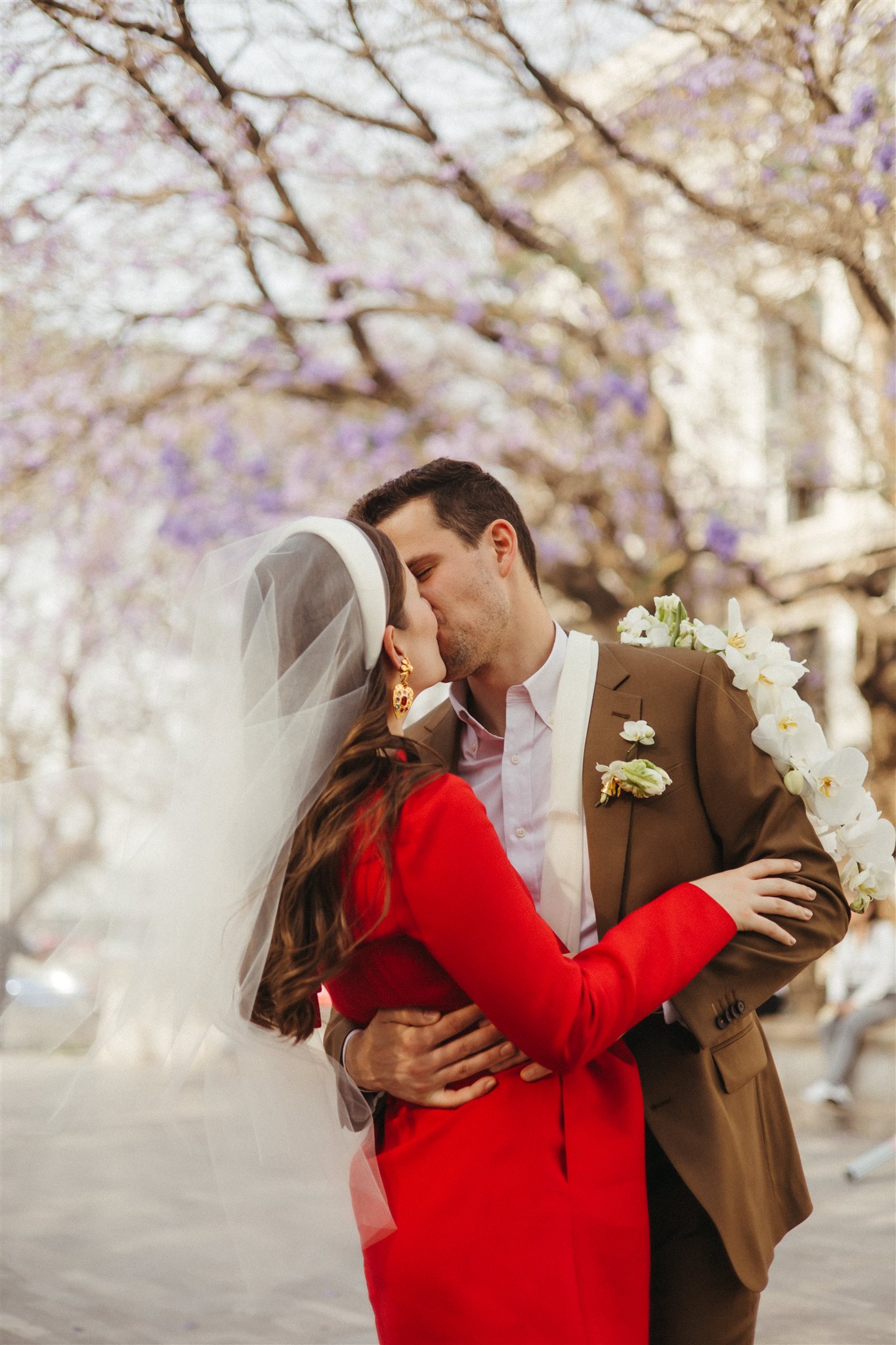 bride and groom walk the streets of Mexico City together after their dreamy elopement 