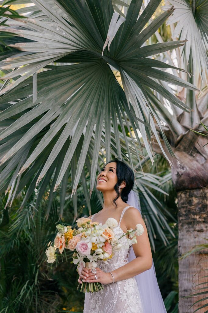 beautiful bride poses for a photo before her stunning coastal acre baja wedding!