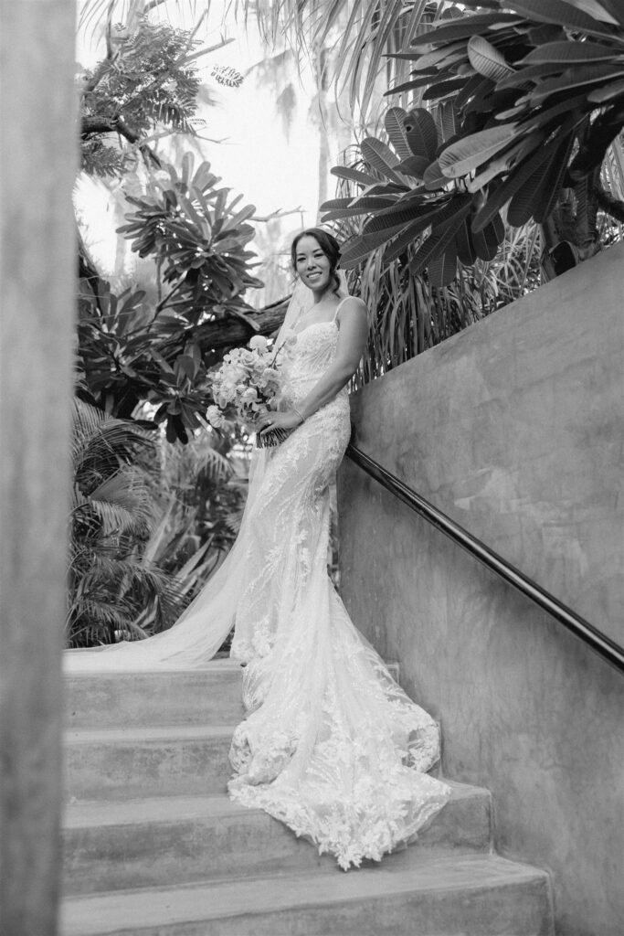 beautiful bride poses for a photo before her stunning coastal acre baja wedding!