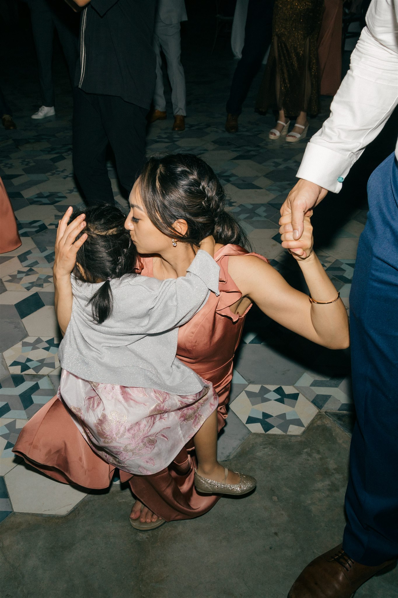 guests celebrate during the dreamy tropical wedding reception