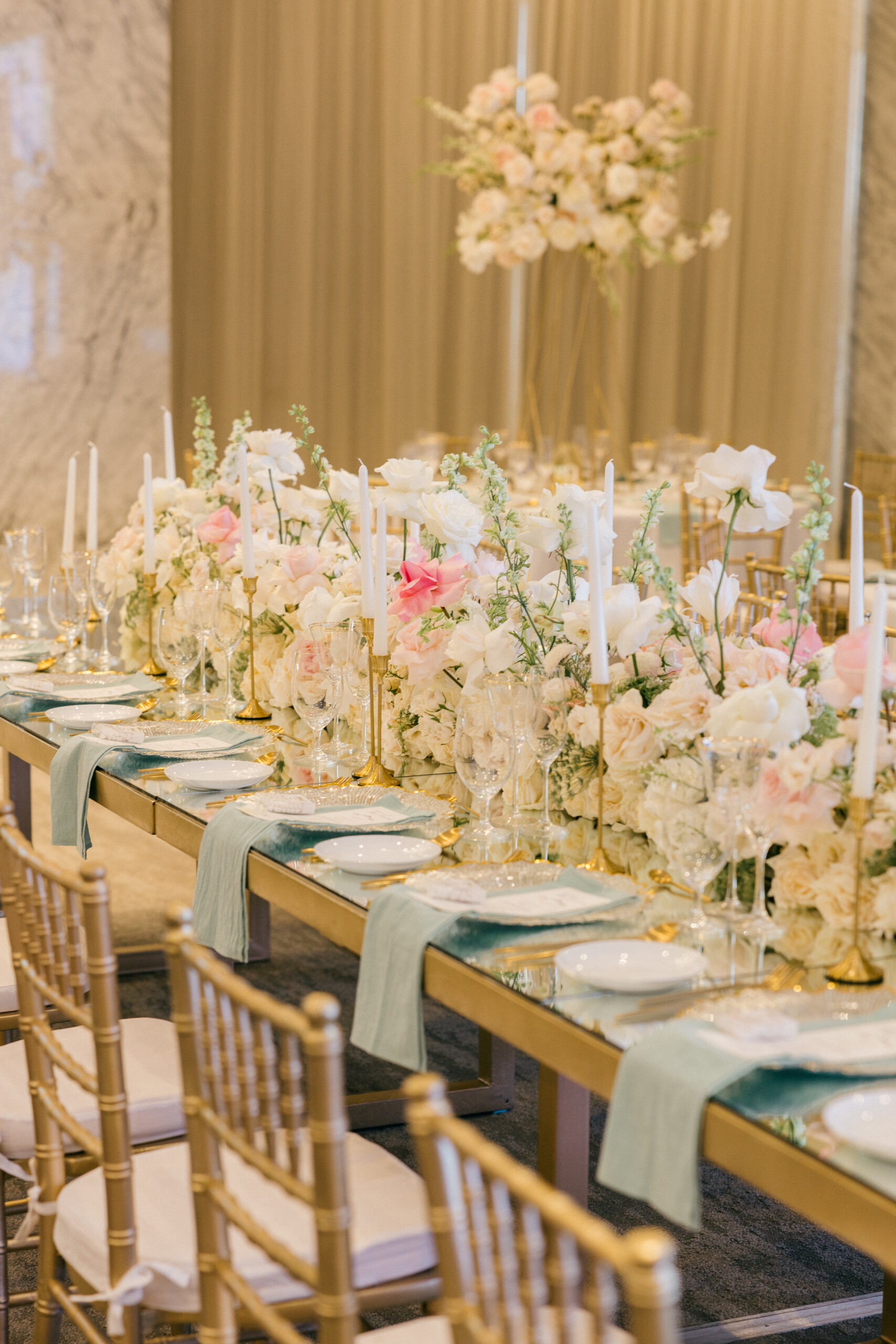 elegant white wedding florals with gold hardware wedding reception decor 