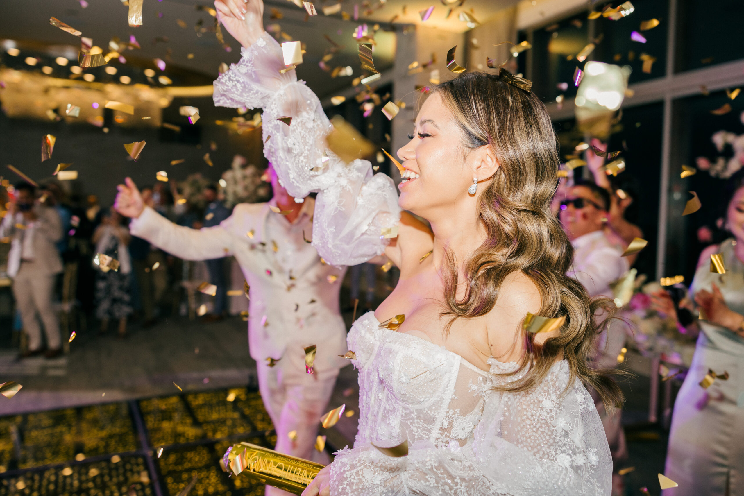 bride and groom celebrate on the dance floor