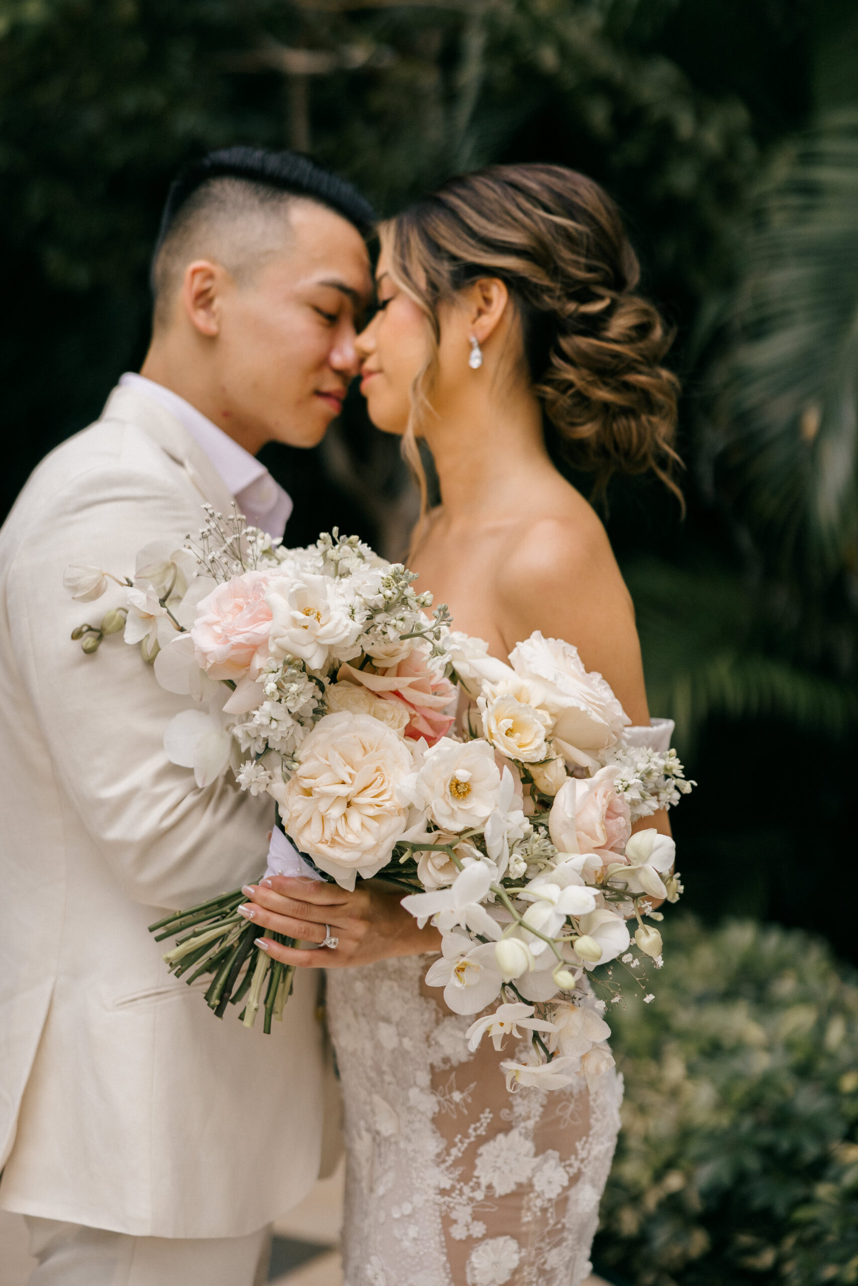 bride and groom pose together after their dreamy Cancun wedding