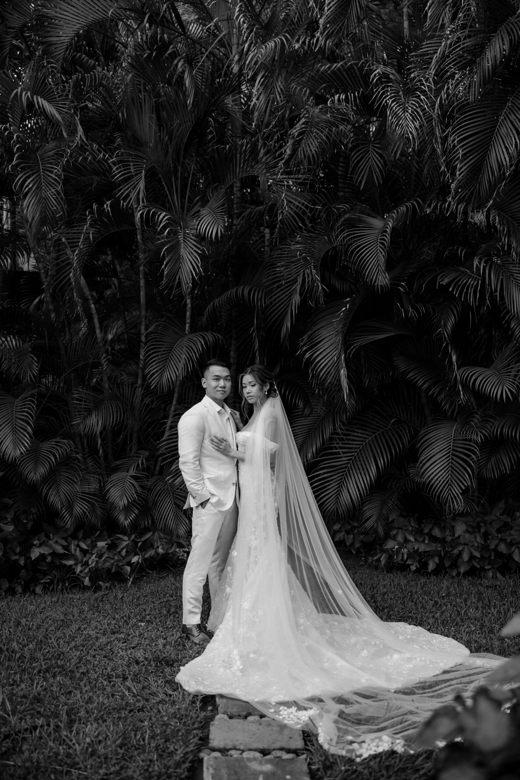 bride and groom pose together after their dreamy Cancun wedding