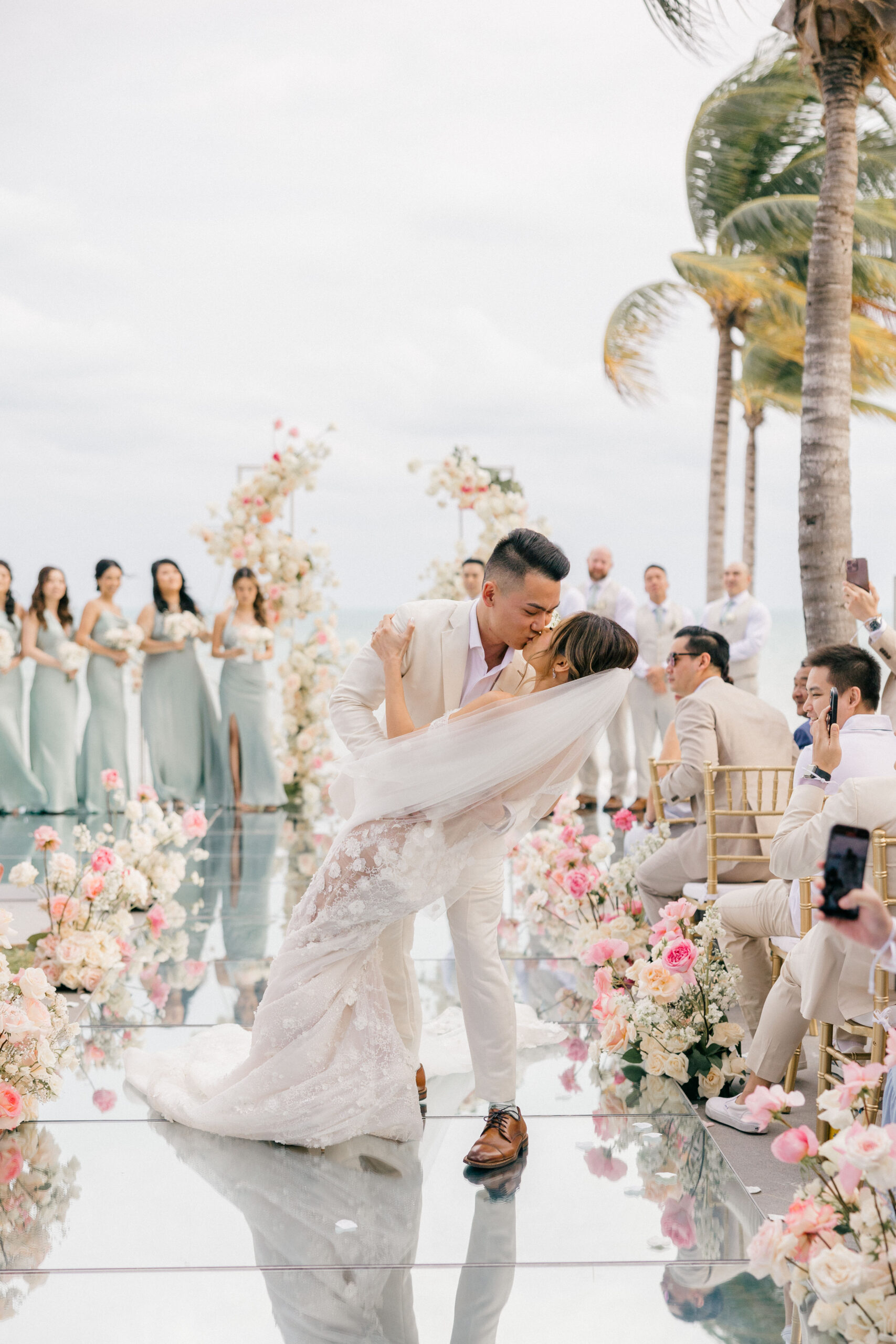 bride and groom share a kiss after their dreamy Cancun wedding day