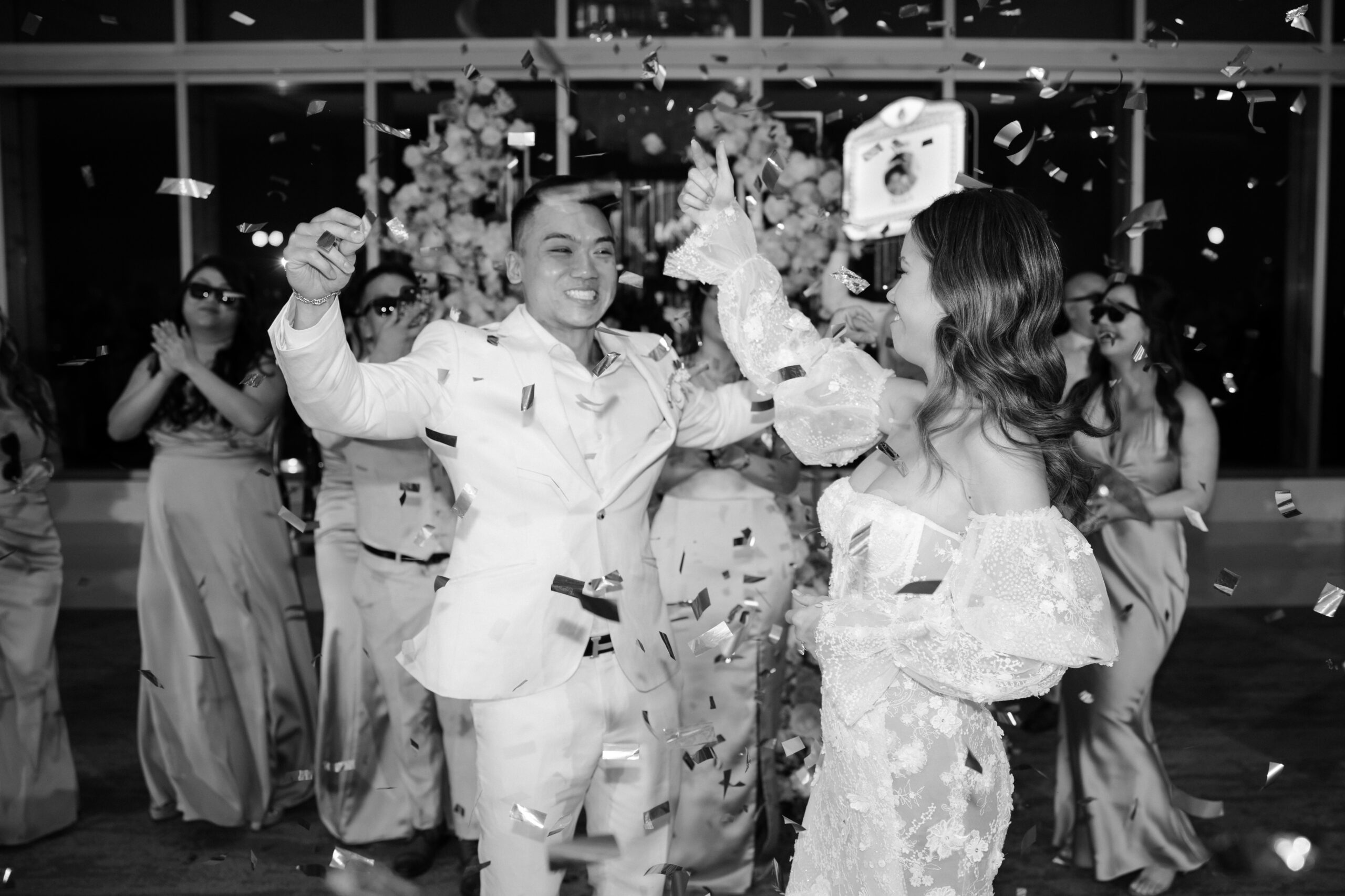 bride and groom celebrate on the dance floor