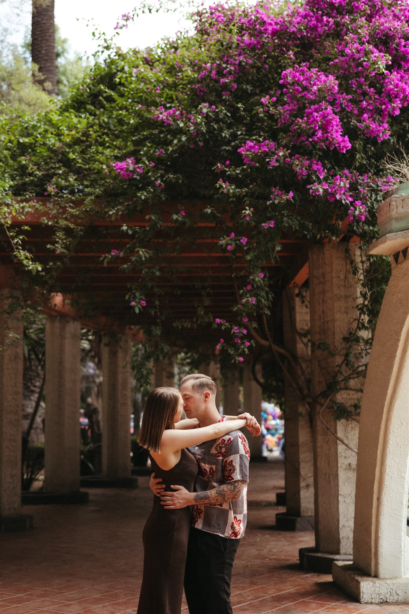 beautiful couple share a moment together during their Mexico City photoshoot