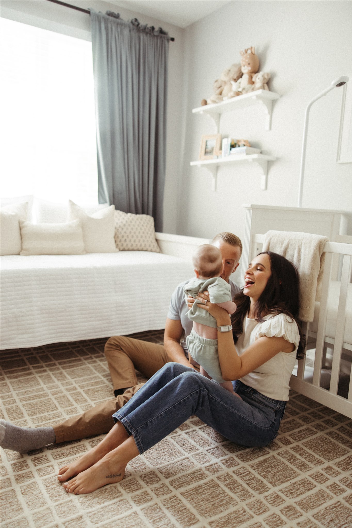 family poses during their in-home newborn sessions