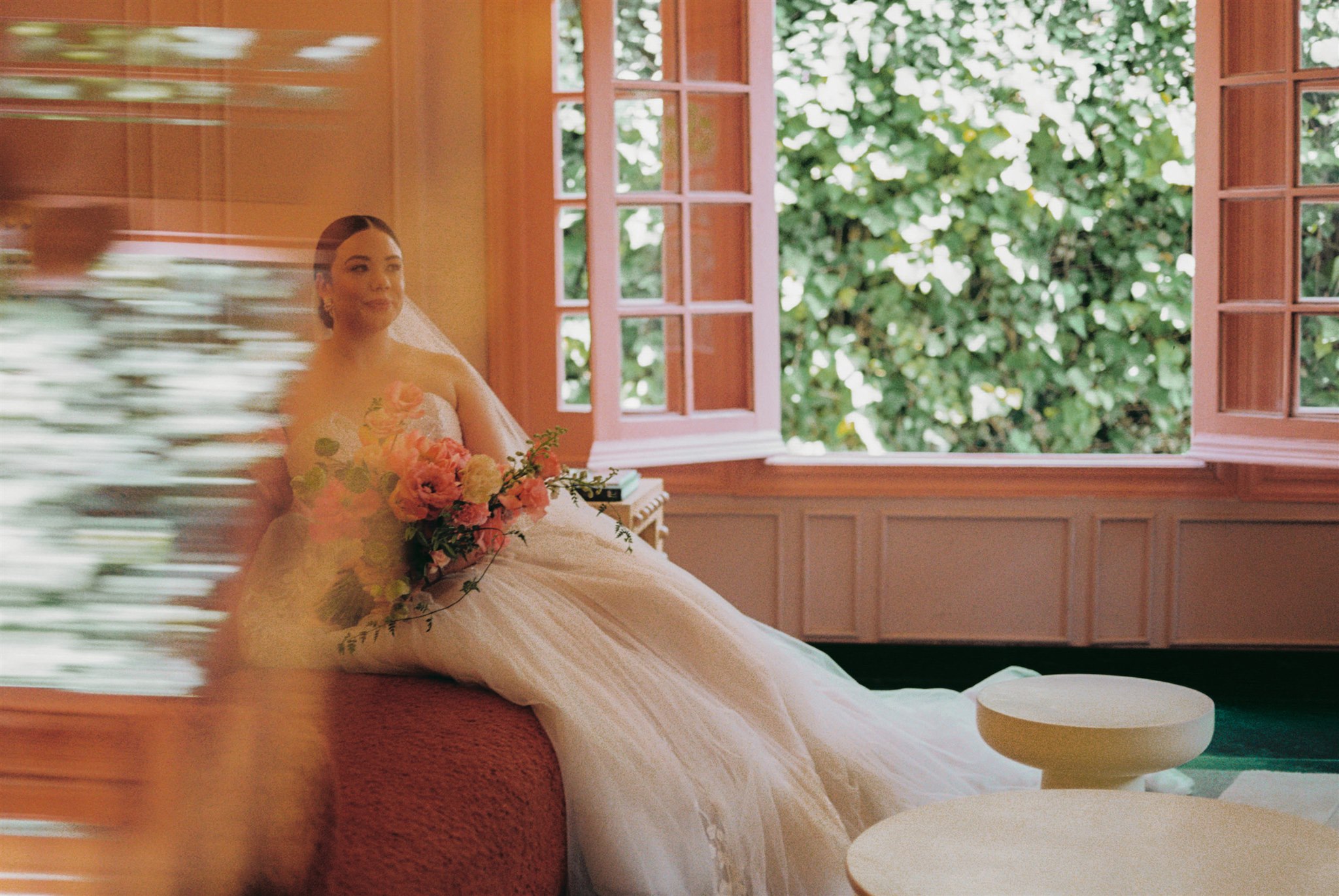Bridal portrait in color-drenched room at Ignacia Guest House Roma Norte