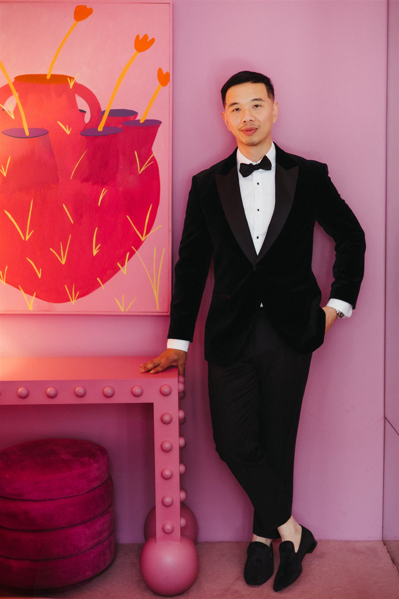 Groom preparing at Ignacia Guest House with modern Mexican furnishings