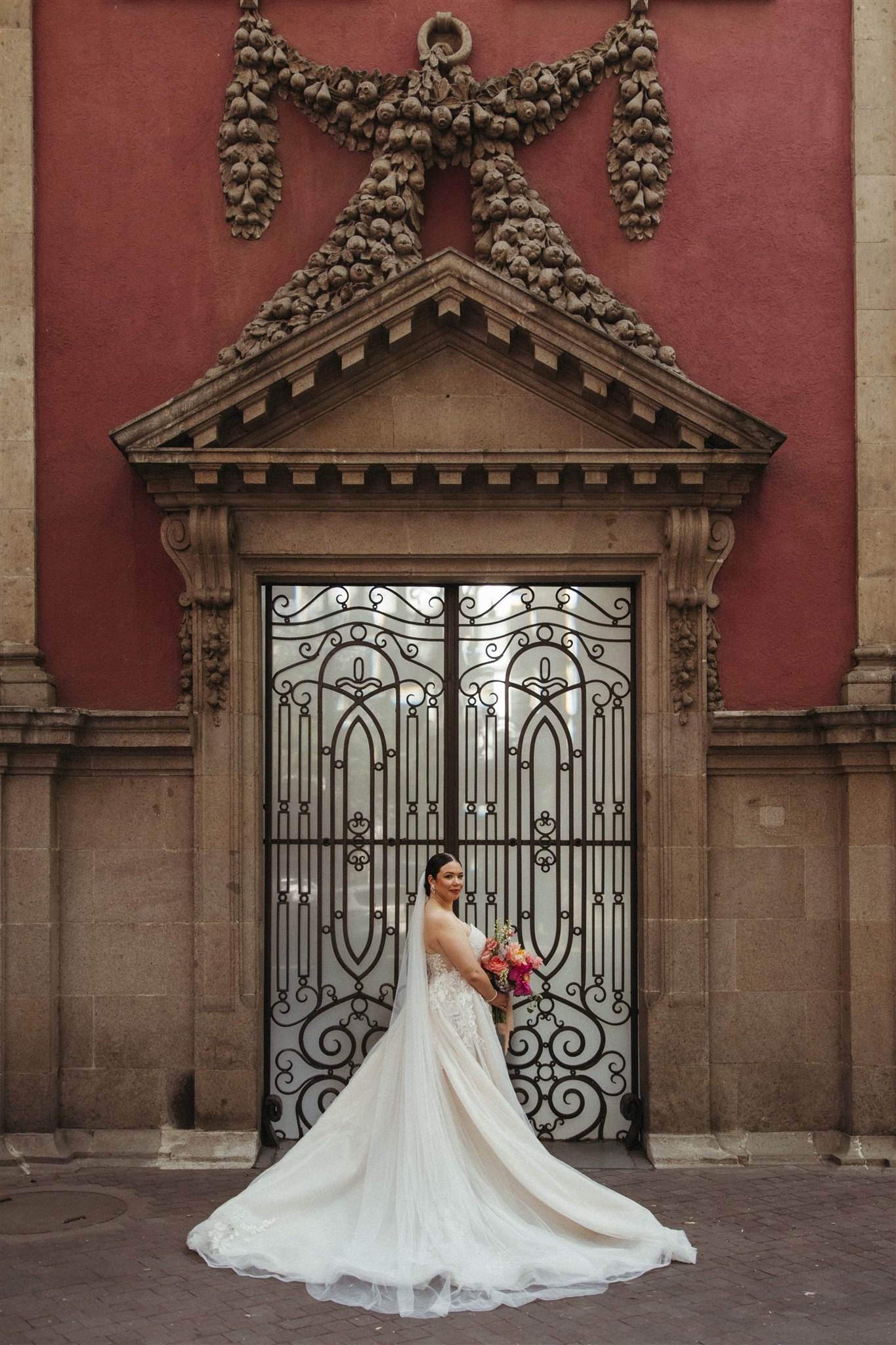 elegant bride poses for a portrait before her wedding day