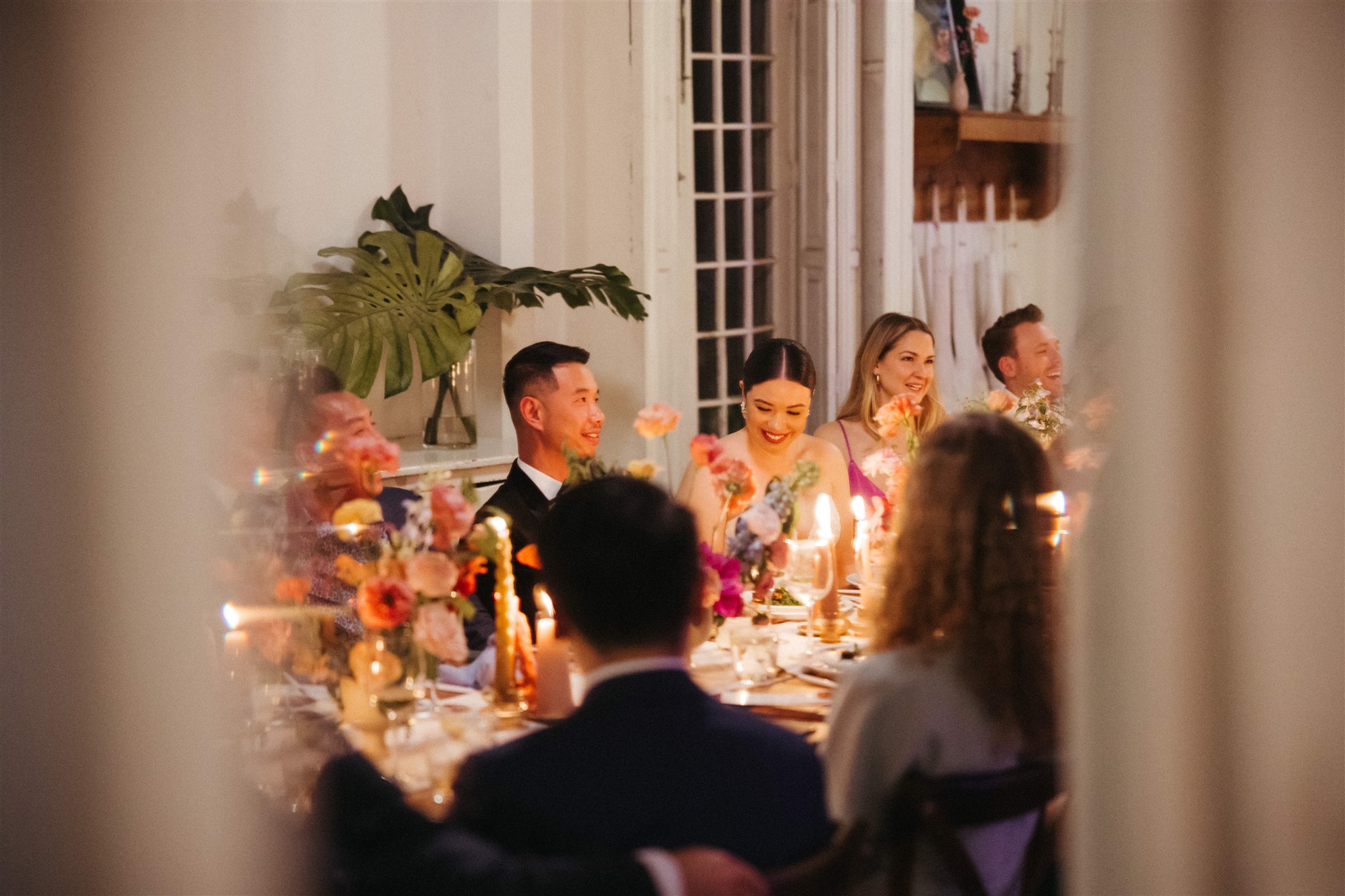 Evening ambiance with candles and greenery at Mexico City wedding